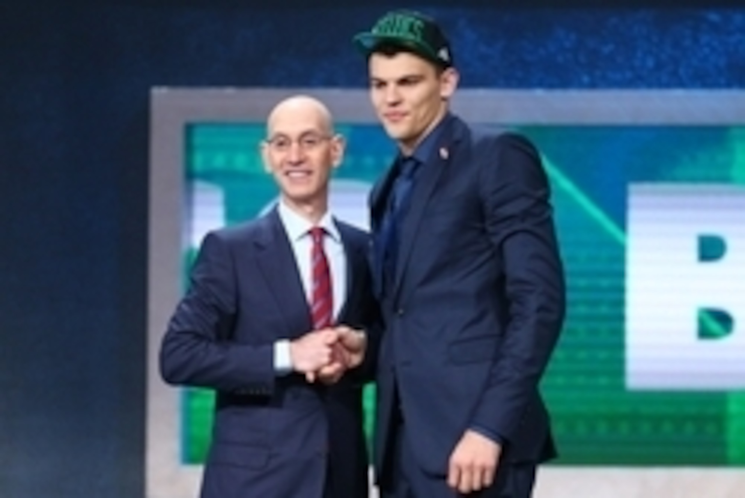 Jun 23, 2016; New York, NY, USA; Ante Zizic greets NBA commissioner Adam Silver after being selected as the number twenty-three overall pick to the Boston Celtics in the first round of the 2016 NBA Draft at Barclays Center. Mandatory Credit: Jerry Lai-USA Jun 23, 2016; New York, NY, USA; Ante Zizic greets NBA commissioner Adam Silver after being selected as the number twenty-three overall pick to the Boston Celtics in the first round of the 2016 NBA Draft at Barclays Center. Mandatory Credit: Jerry Lai-USA