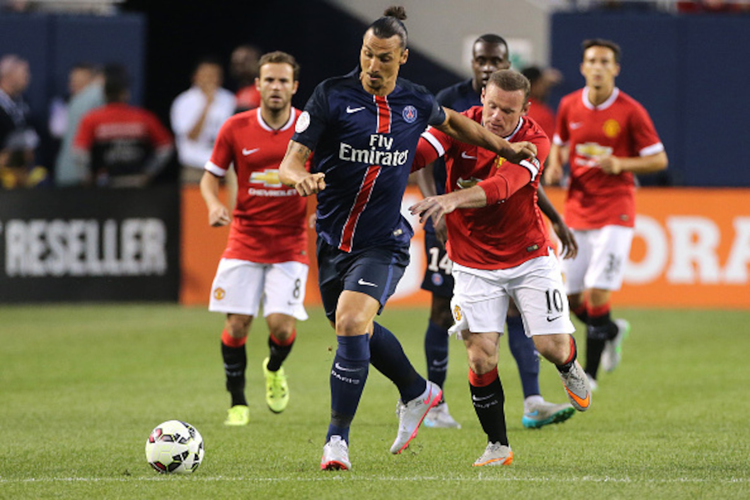 CHICAGO, IL - JULY 29: Zlatan Ibrahimovic of PSG and Wayne Rooney of Manchester United in action during the International Champions Cup 2015 game between Manchester United and Paris Saint-Germain at Soldier Field on July 29, 2015 in Chicago, Illinois. (Ph