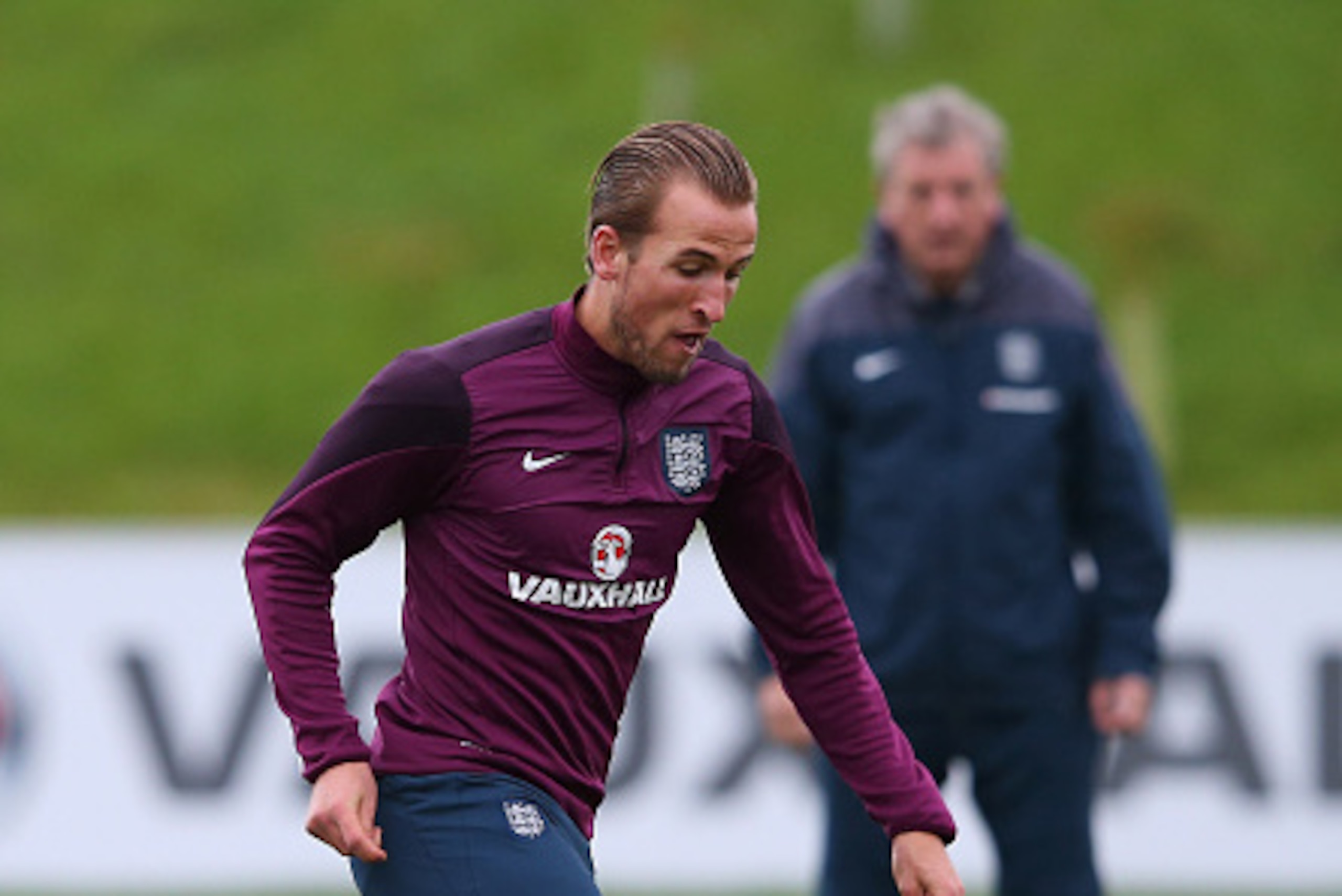 BURTON-UPON-TRENT, ENGLAND - OCTOBER 07: Harry Kane of England controls the ball as Roy Hodgson the England manager looks on during the England training session at St Georges Park on October 7, 2015 in Burton-upon-Trent, England. (Photo by Alex Livesey/ BURTON-UPON-TRENT, ENGLAND - OCTOBER 07: Harry Kane of England controls the ball as Roy Hodgson the England manager looks on during the England training session at St Georges Park on October 7, 2015 in Burton-upon-Trent, England. (Photo by Alex Livesey/