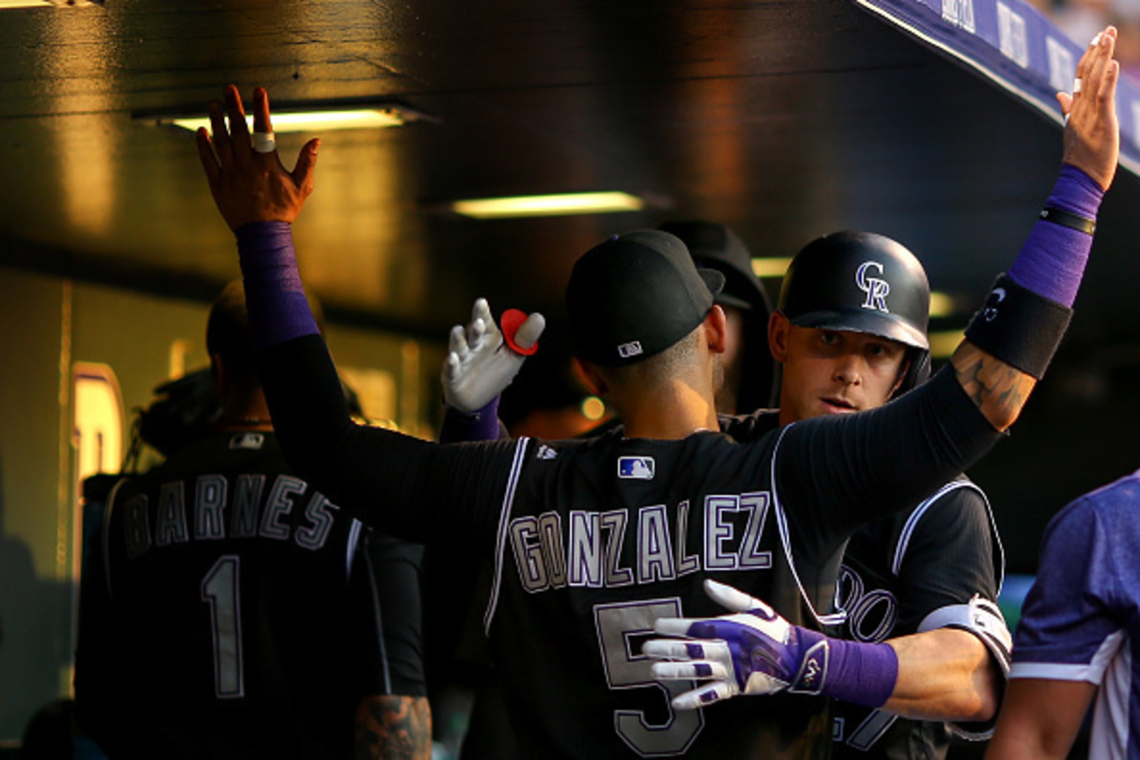 DENVER, CO - JULY 7: Trevor Story #27 of the Colorado Rockies celebrates his solo home run with Carlos Gonzalez #5 during the fifth inning against the Philadelphia Phillies at Coors Field on July 7, 2016 in Denver, Colorado. (Photo by Justin Edmonds/Gett DENVER, CO - JULY 7: Trevor Story #27 of the Colorado Rockies celebrates his solo home run with Carlos Gonzalez #5 during the fifth inning against the Philadelphia Phillies at Coors Field on July 7, 2016 in Denver, Colorado. (Photo by Justin Edmonds/Gett