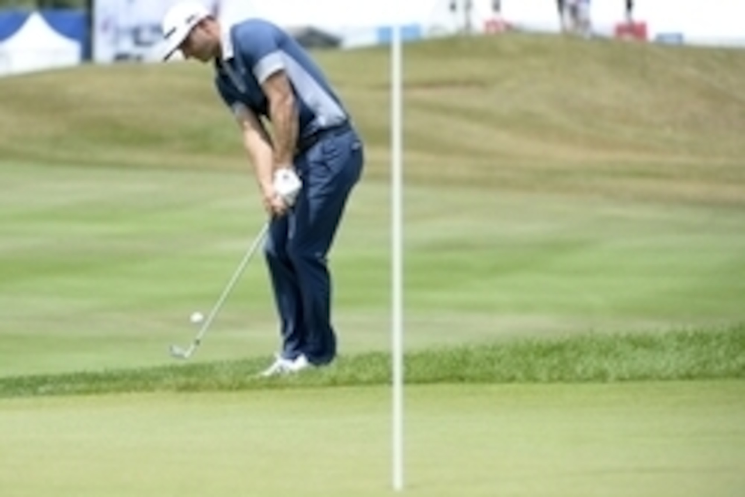 Jul 21, 2016; Oakville, Ontario, CAN; Dustin Johnson (USA) plays his approach shot on the first hole during the first round of the RBC Canadian Open golf tournament at Glen Abbey Golf Club. Mandatory Credit: Eric Bolte-USA TODAY Sports
