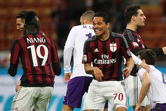 MILAN, ITALY - JANUARY 17:  Carlos Bacca (R) of AC Milan celebrates with his team-mate M Baye Niang (L) after scoring the opening goal during the Serie A match between AC Milan and ACF Fiorentina at Stadio Giuseppe Meazza on January 17, 2016 in Milan, Ita