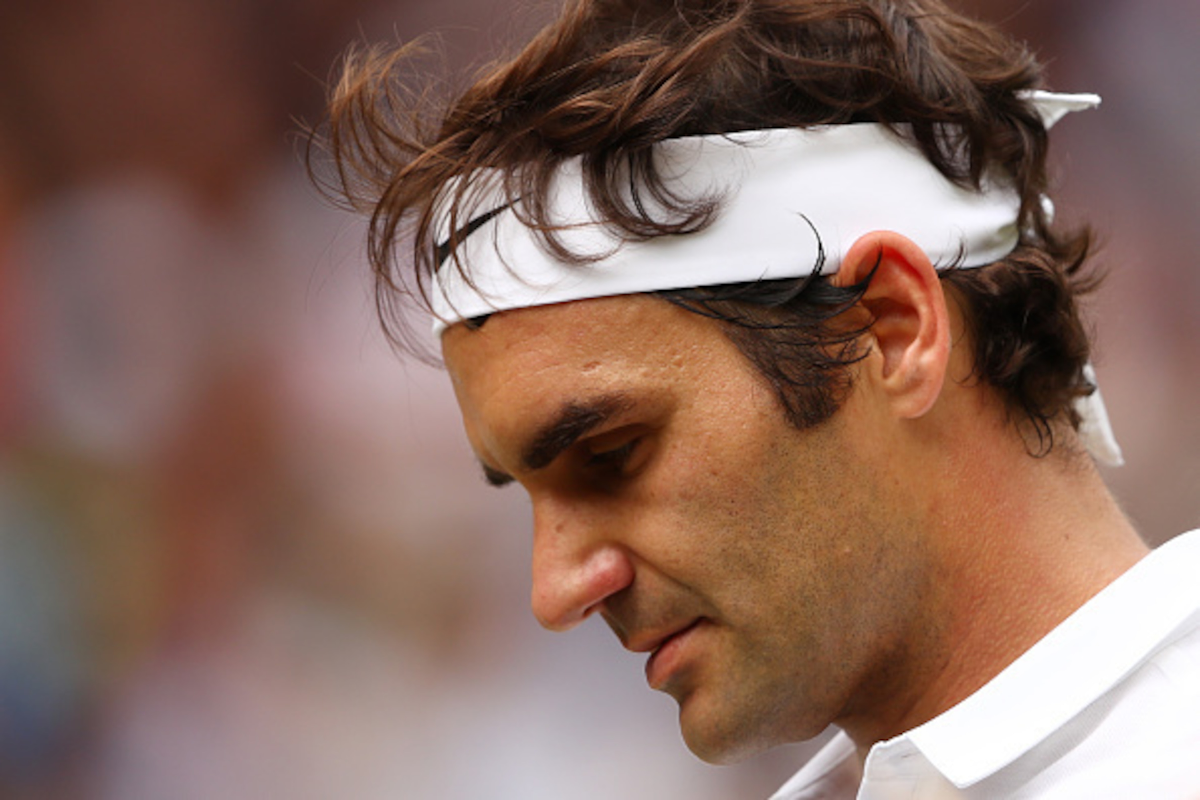 LONDON, ENGLAND - JULY 08:  Roger Federer of Switzerland looks on during the Men's Singles Semi Final match against Milos Raonic of Canada on day eleven of the Wimbledon Lawn Tennis Championships at the All England Lawn Tennis and Croquet Club on July 8,