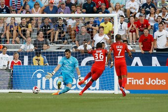 COLUMBUS, OH - JULY 27:  Jonathan Ikone #36 of Paris Saint-Germain F.C. beats Kiko Casilla #13 of Real Madrid C.F. during the first half on July 27, 2016 at Ohio Stadium in Columbus, Ohio. (Photo by Kirk Irwin/Getty Images)