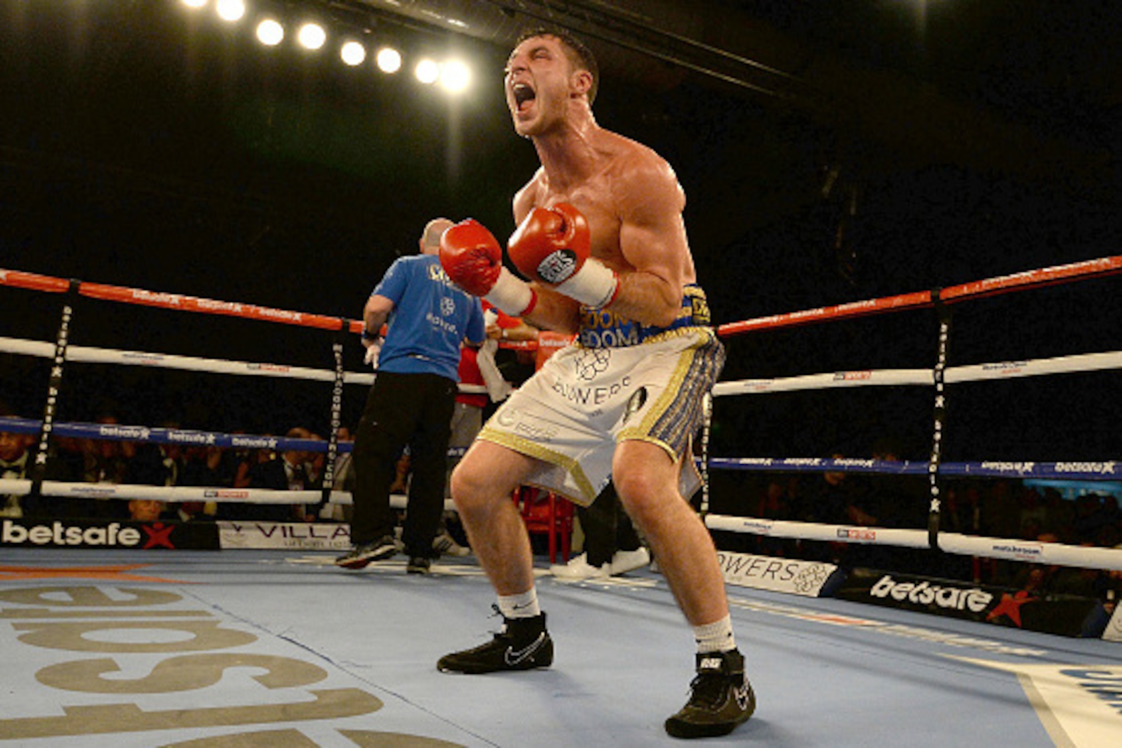 HULL, ENGLAND - MARCH 07:  Tommy Coyle celebrates beating Martin Gethin after their Lightweight contest at The Hull Arena on March 7, 2015 in Hull, England.  (Photo by Nigel Roddis/Getty Images)
