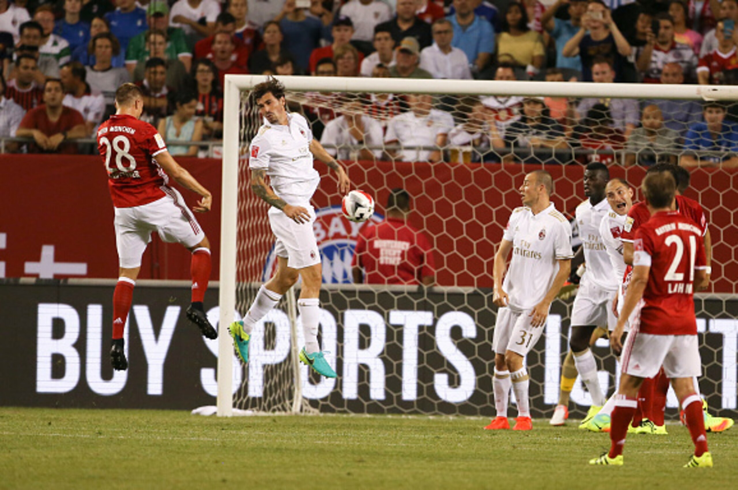 Holger Badstuber #28 FC Bayern Munich and Alessio Romagnoli #13 of AC Milan fight for the ball at the International Champions Cup on July 27, 2016 at Solider Field Stadium in Chicago, Illinois.  / AFP / Tasos Katopodis        (Photo credit should read TAS