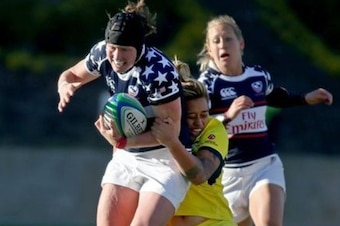 Australia's Hanna Sio tackles Jillion Potter of the U.S. in 2014.