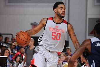 LAS VEGAS, NV - JULY 10:  DJ Kennedy #50 of the Houston Rockets dribbles the ball against NBA D-League Select on July 10, 2015 at the Cox Pavilion in Las Vegas, Nevada. NOTE TO USER: User expressly acknowledges and agrees that, by downloading and or using
