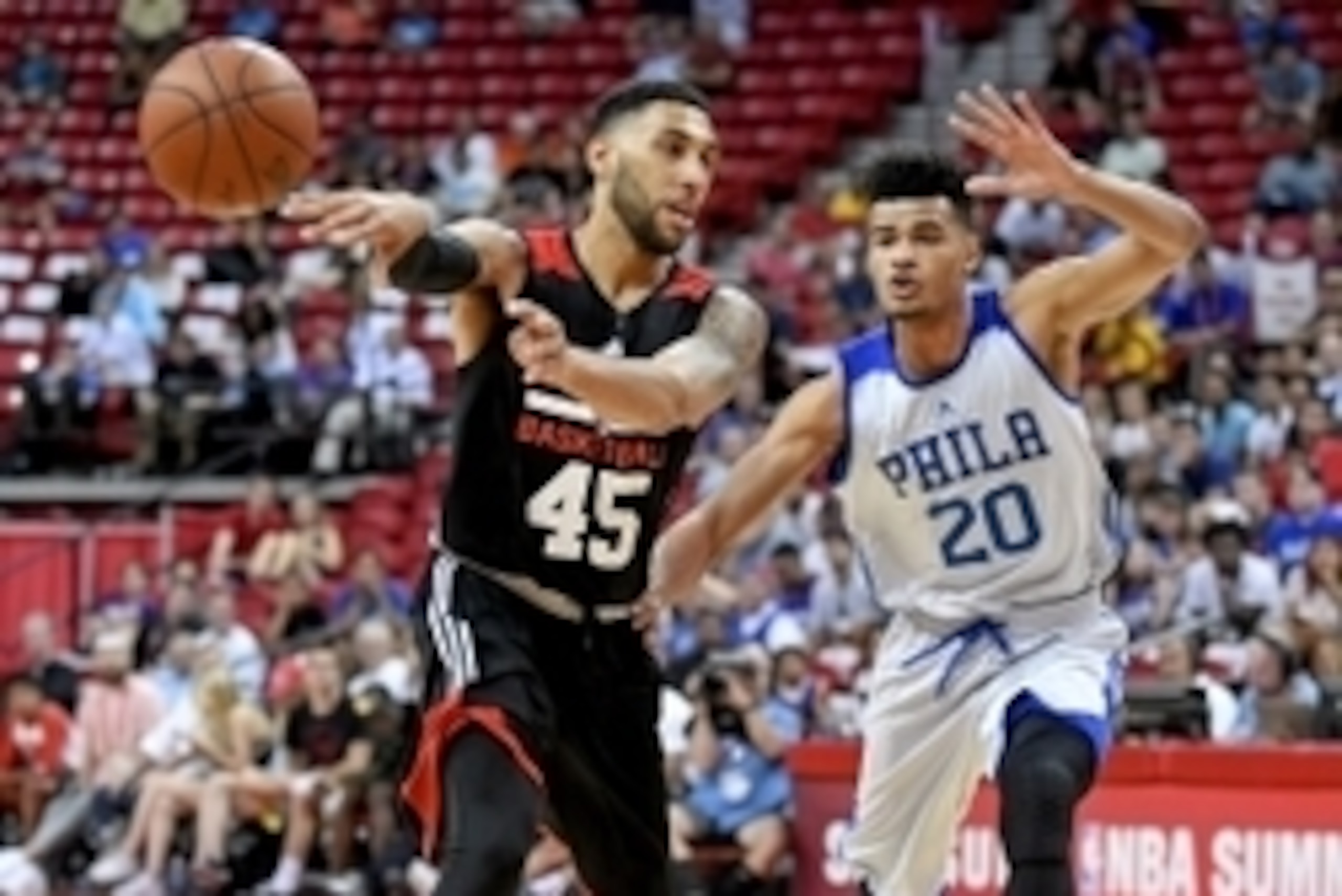 Jul 10, 2016; Las Vegas, NV, USA; Chicago Bulls guard Denzel Valentine (45) passes the ball away from the defense of Philadelphia 76ers guard Timothe Luwawu-Cabarrot (20) during an NBA Summer League game at Thomas & Mack Center. Chicago won the game 83- Jul 10, 2016; Las Vegas, NV, USA; Chicago Bulls guard Denzel Valentine (45) passes the ball away from the defense of Philadelphia 76ers guard Timothe Luwawu-Cabarrot (20) during an NBA Summer League game at Thomas & Mack Center. Chicago won the game 83-