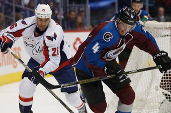 Colorado's Tyson Barrie, right