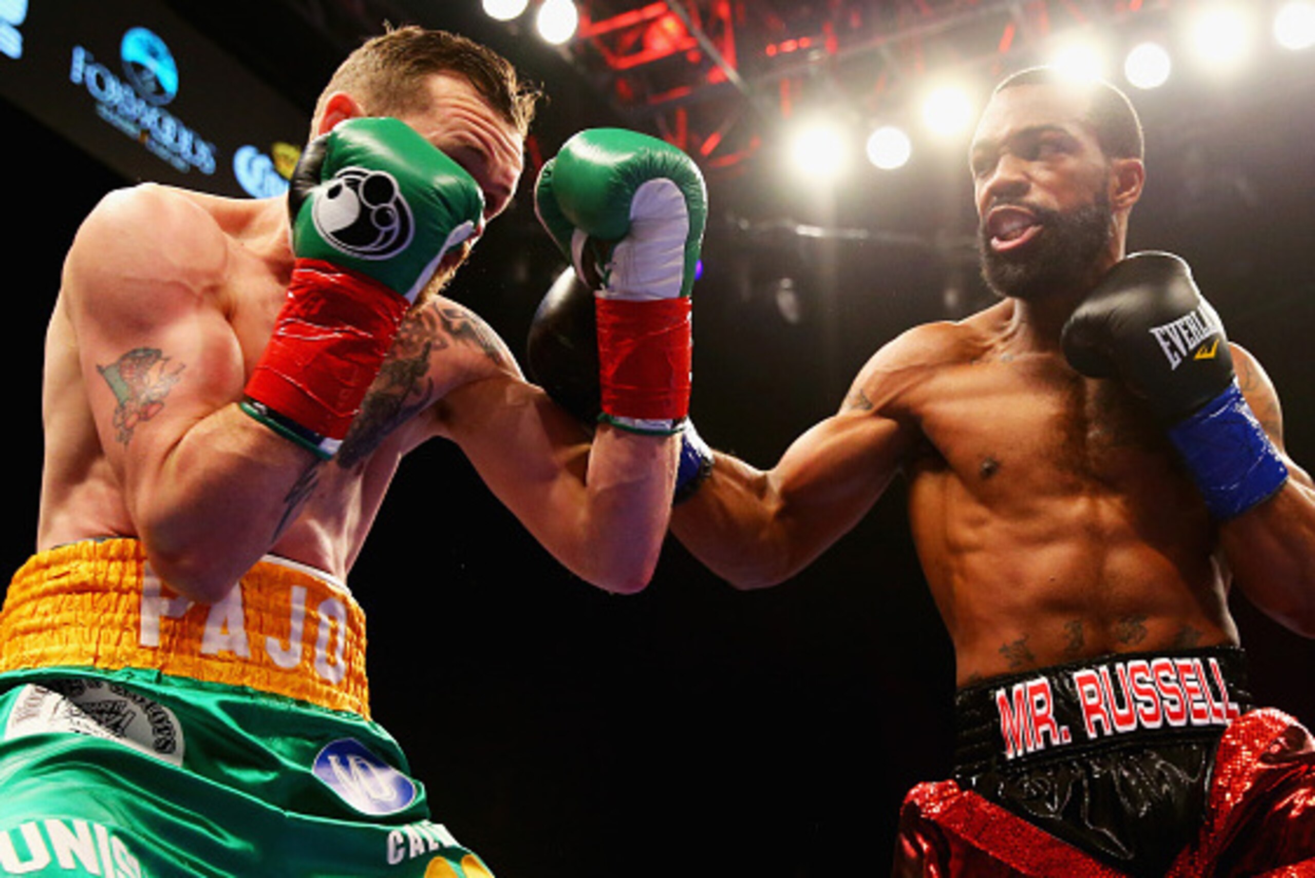 MASHANTUCKET, CT - APRIL 16: Gary Russell Jr. throws a right at Patrick Hyland during their WBC World Featherweight Championship bout at Foxwoods Resort Casino on April 16, 2016 in Mashantucket, Connecticut.  (Photo by Maddie Meyer/Getty Images)