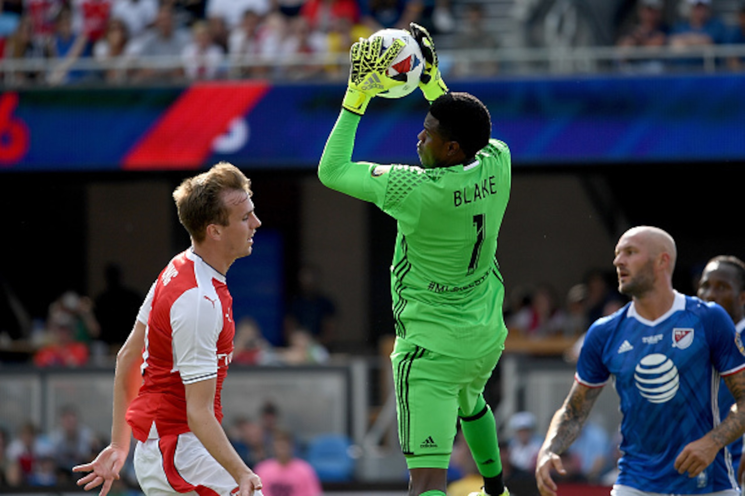 SAN JOSE, CA - JULY 28:  Goalkeeper Andre Blake #1 of MLS All-Stars leaps in the air to gain control of he ball away from Rob Holding #16 of Arsenal FC during the first half of the AT&T MLS All-Star Game at Avaya Stadium on July 28, 2016 in San Jose, Cali