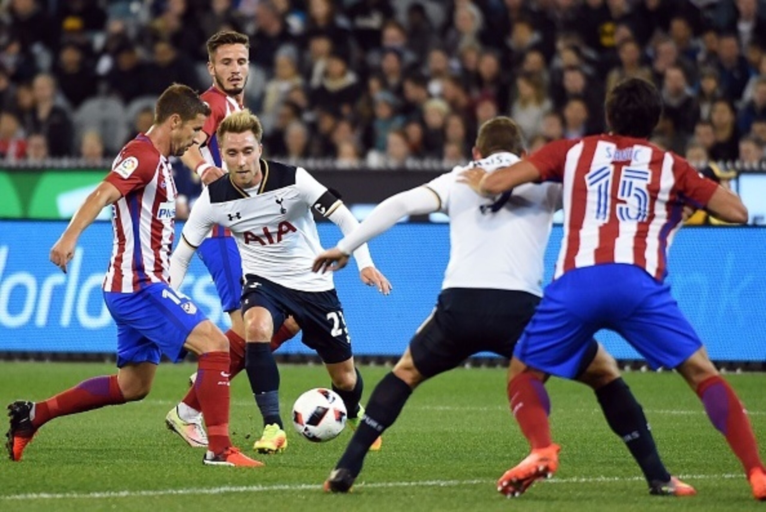 Atletico Madrid midfielder Gabi (L) fights for the ball with Tottenham Hotspur player Christian Eriksen (2nd L) during the International Champions Cup football match between English Premier League team Tottenham Hotspur and Spanish club Atletico Madrid in Atletico Madrid midfielder Gabi (L) fights for the ball with Tottenham Hotspur player Christian Eriksen (2nd L) during the International Champions Cup football match between English Premier League team Tottenham Hotspur and Spanish club Atletico Madrid in