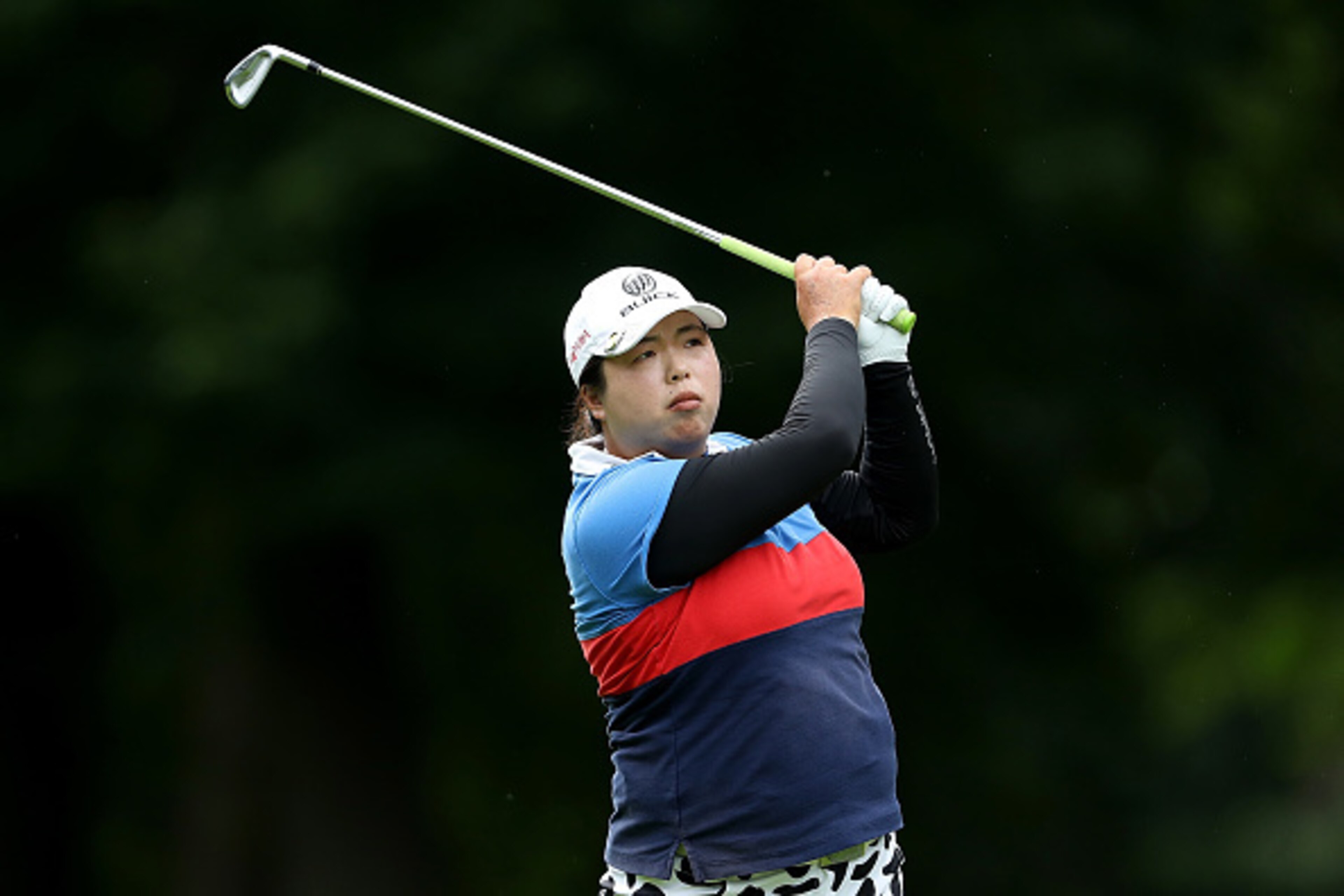 WOBURN, ENGLAND - JULY 29:  Shanshan Feng of China hits her second shot on the 18th hole during the second round of the Ricoh Women's British Open at Woburn Golf Club on July 29, 2016 in Woburn, England.  (Photo by David Cannon/Getty Images)