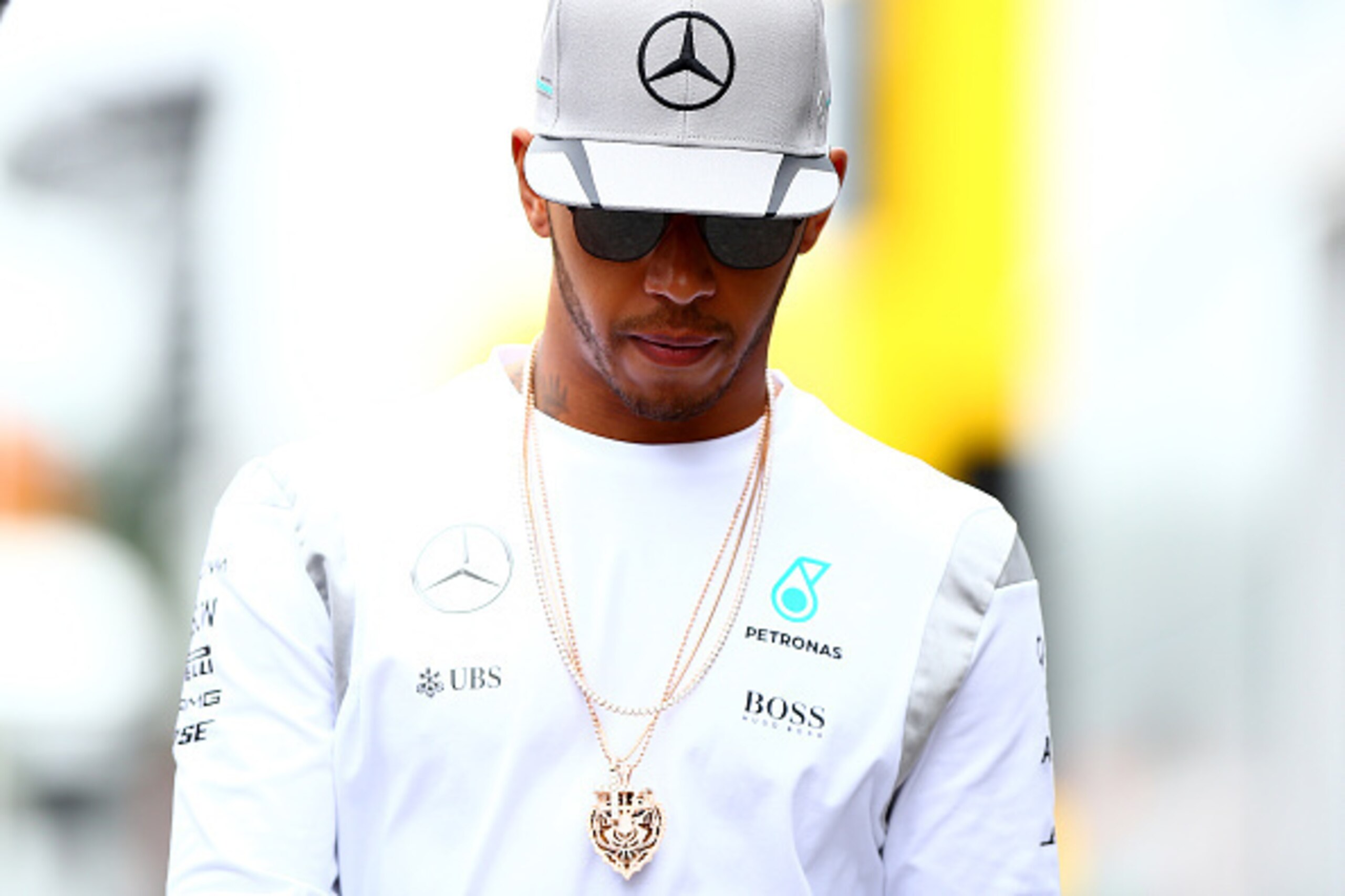 HOCKENHEIM, GERMANY - JULY 28:  Lewis Hamilton of Great Britain and Mercedes GP walks in the Paddock during previews to the Formula One Grand Prix of Germany at Hockenheimring on July 28, 2016 in Hockenheim, Germany.  (Photo by Dan Istitene/Getty Images)