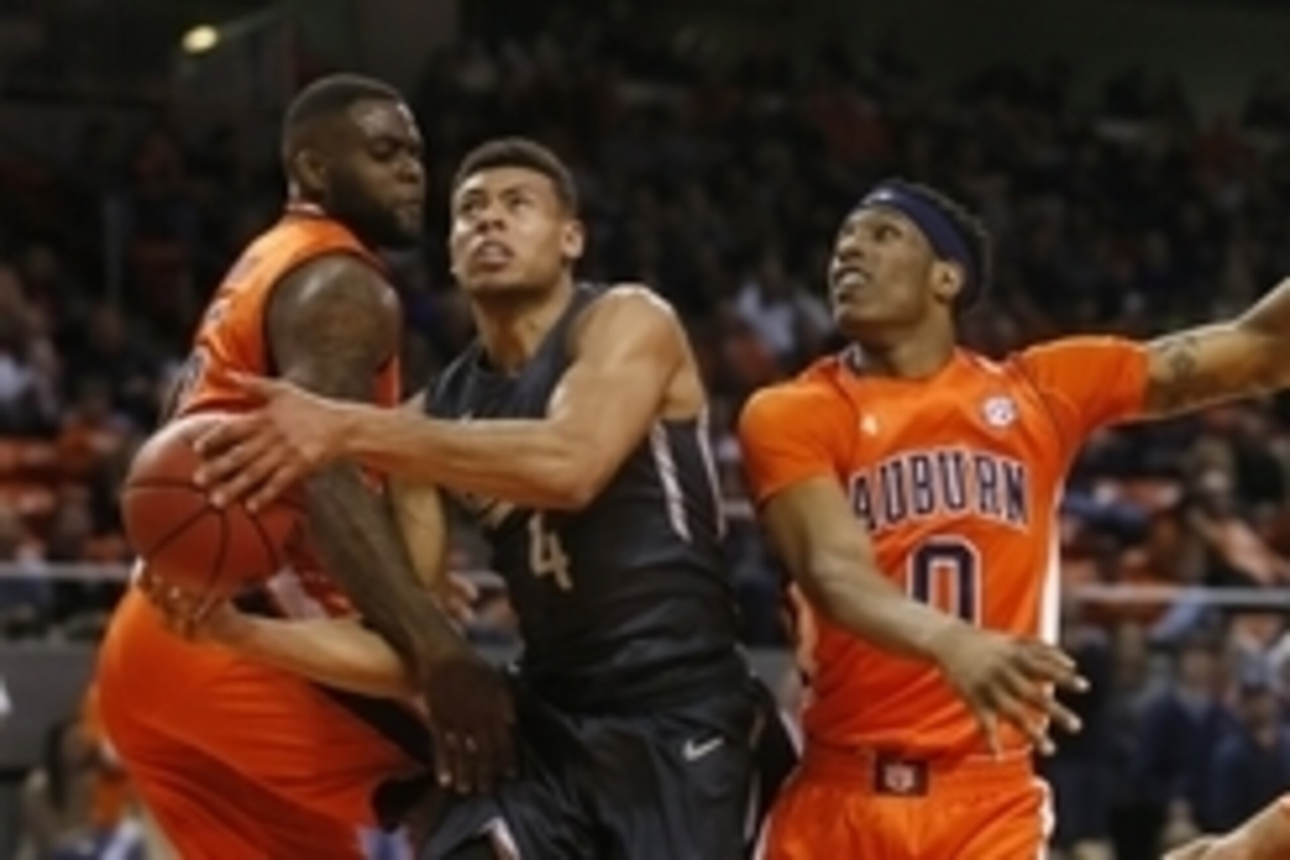Feb 13, 2016; Auburn, AL, USA;  Vanderbilt Commodores guard Wade Baldwin (4) takes a shot between Auburn Tigers forward Cinmeon Bowers (5) and forward Horace Spencer (0) during the first half at Auburn Arena.  The Commodores beat the Tigers 86-57.  Mandat