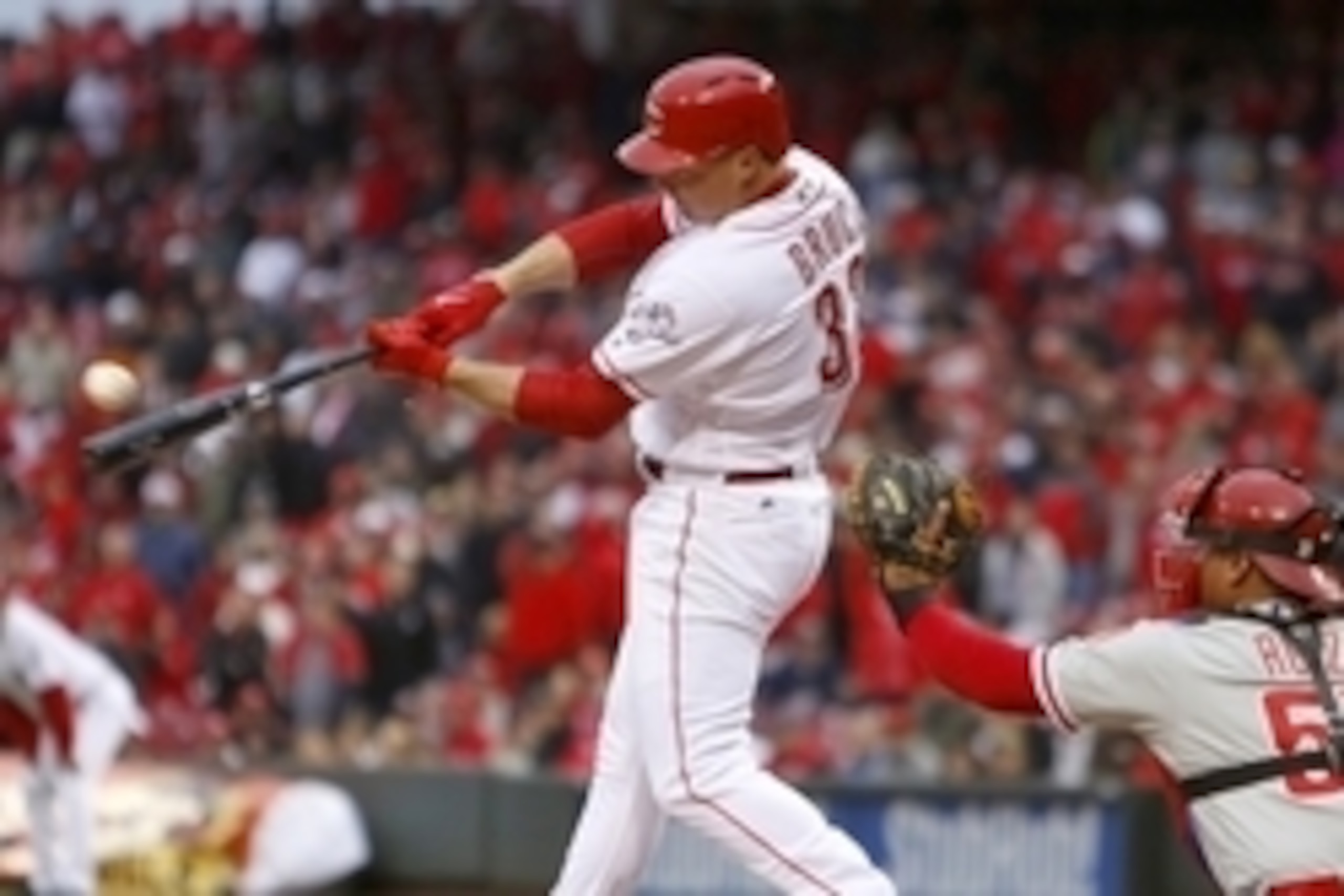 Apr 4, 2016; Cincinnati, OH, USA; Cincinnati Reds right fielder Jay Bruce (32) hits a two-run single during the eighth inning against the Philadelphia Phillies at Great American Ball Park. The Reds won 6-2. Mandatory Credit: David Kohl-USA TODAY Sports