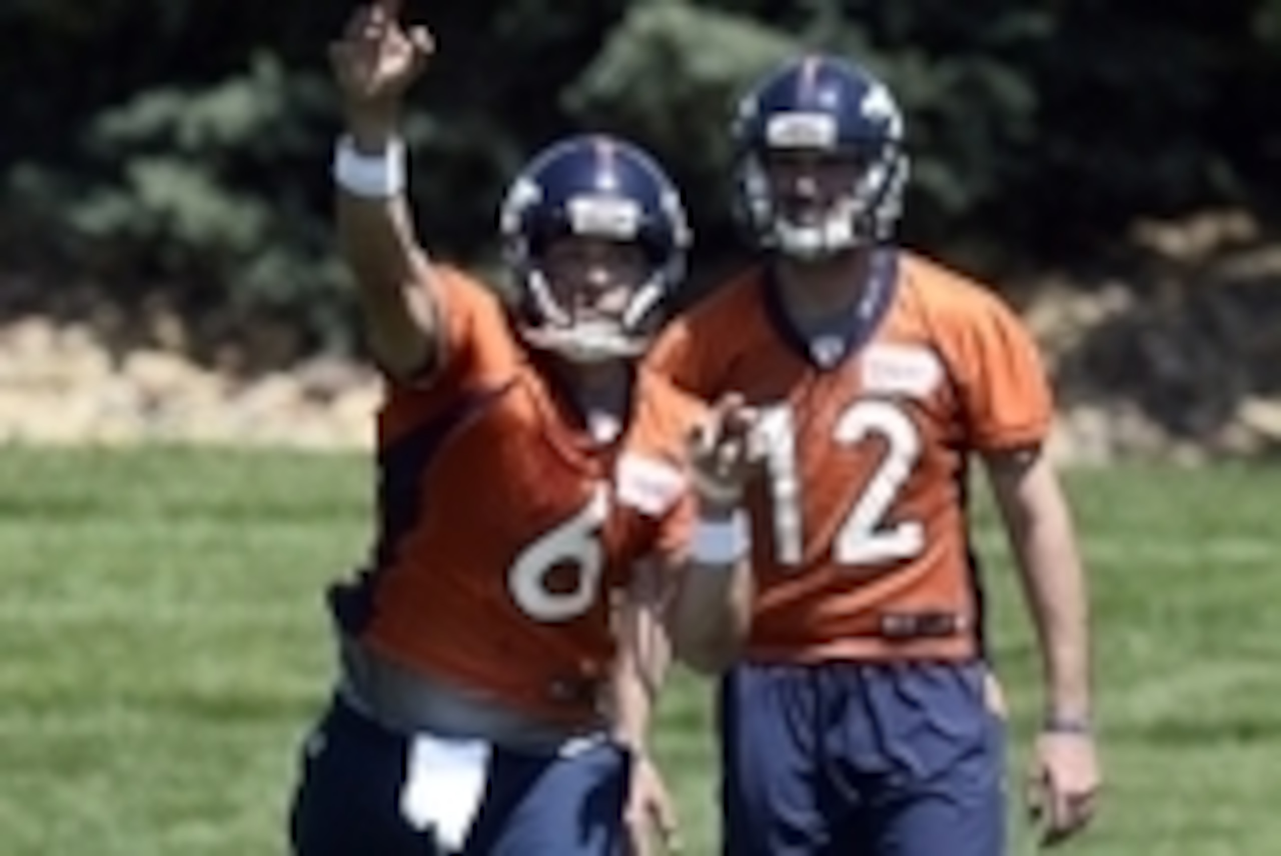 Jun 7, 2016; Englewood, CO, USA; Denver Broncos quarterback Mark Sanchez (6) throws as quarterback Paxton Lynch (12) observes during mini camp drills at the UCHealth Training Center. Mandatory Credit: Ron Chenoy-USA TODAY Sports Jun 7, 2016; Englewood, CO, USA; Denver Broncos quarterback Mark Sanchez (6) throws as quarterback Paxton Lynch (12) observes during mini camp drills at the UCHealth Training Center. Mandatory Credit: Ron Chenoy-USA TODAY Sports