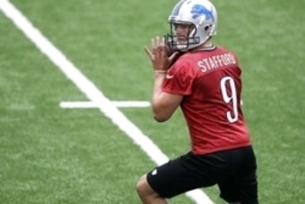 Jul 29, 2016; Allen Park, MI, USA; Detroit Lions quarterback Matthew Stafford (9) drops back for a pass during practice at the Detroit Lions Training Facility. Mandatory Credit: Raj Mehta-USA TODAY Sports