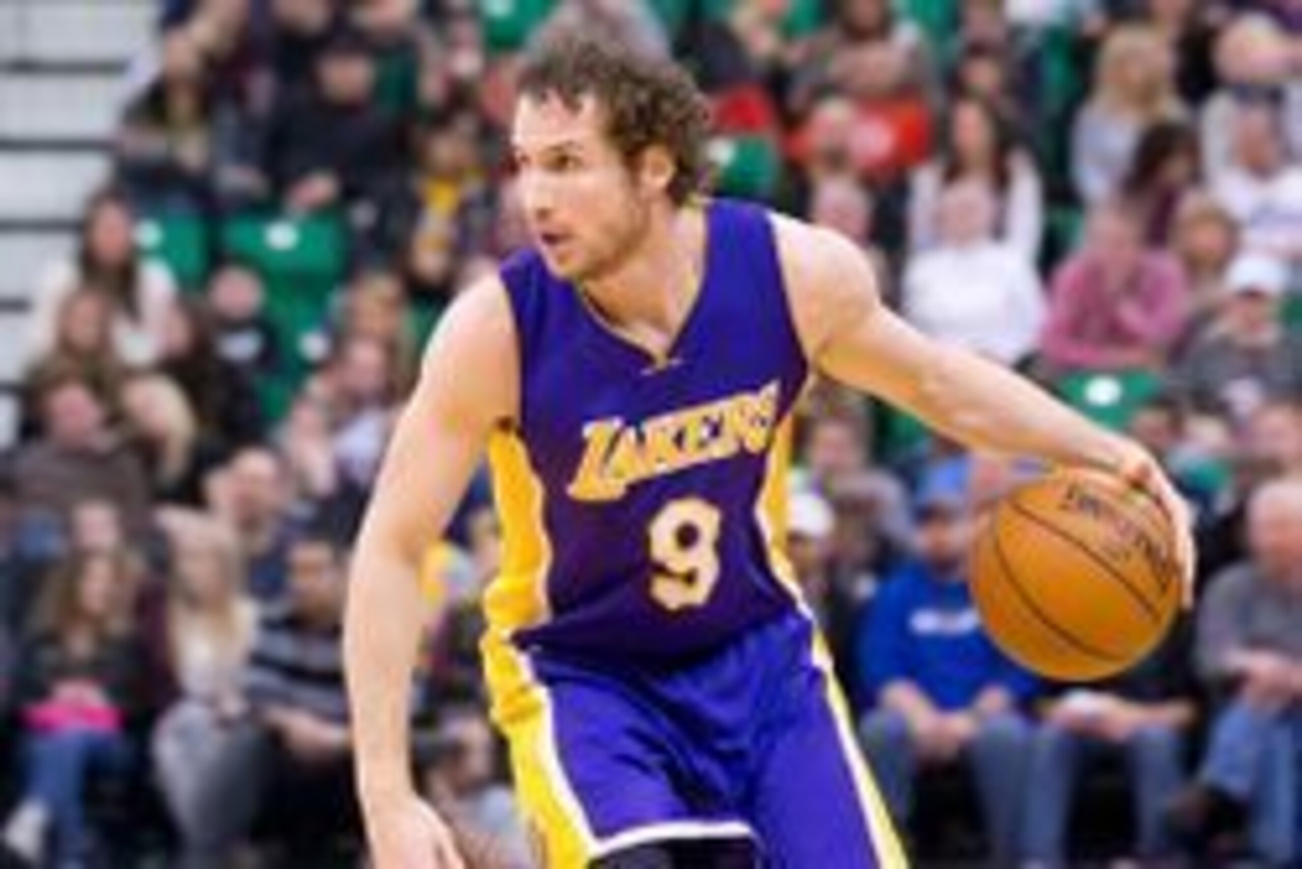 Jan 16, 2016; Salt Lake City, UT, USA; Los Angeles Lakers guard Marcelo Huertas (9) dribbles the ball during the second half against the Utah Jazz at Vivint Smart Home Arena. The Jazz won 109-82. Mandatory Credit: Russ Isabella-USA TODAY Sports
