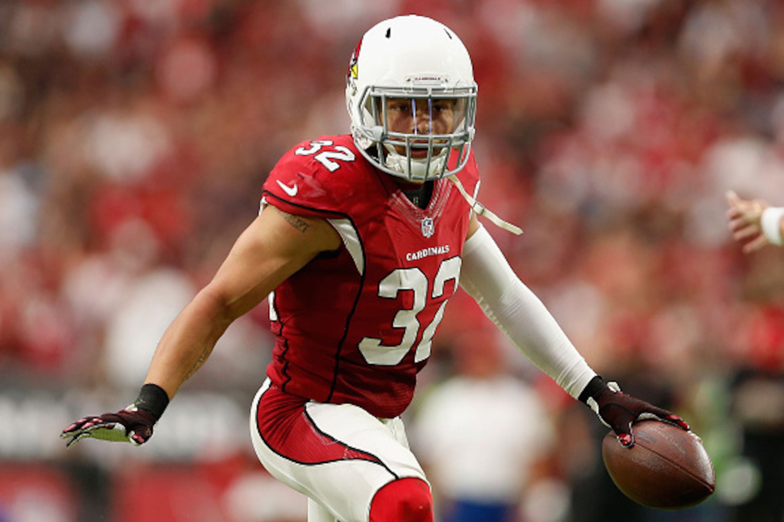 GLENDALE, AZ - SEPTEMBER 27:  Free safety Tyrann Mathieu #32 of the Arizona Cardinals celebrates after an interception during the second quarter of the NFL game against the San Francisco 49ers at the University of Phoenix Stadium on September 27, 2015 in 