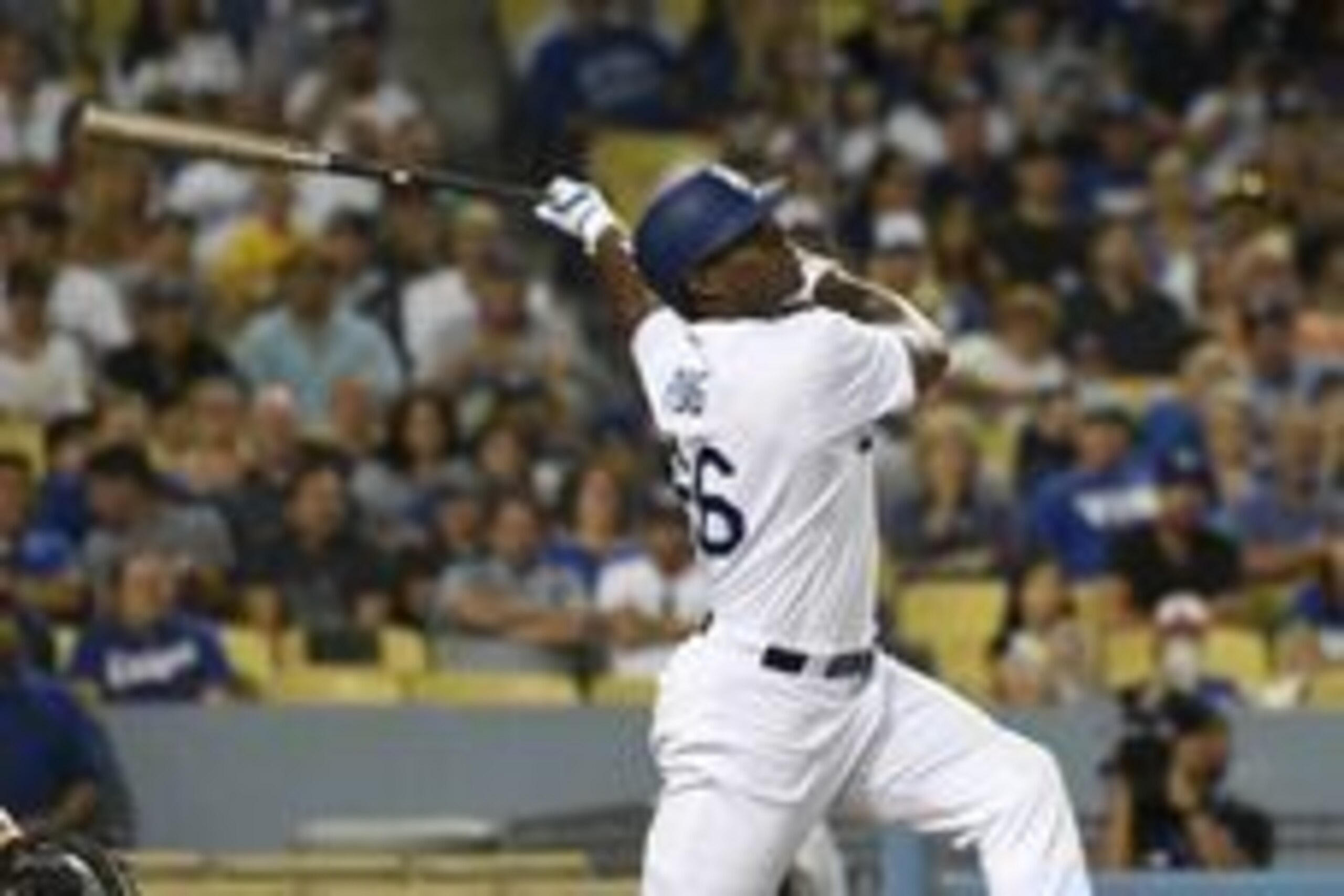 Jul 29, 2016; Los Angeles, CA, USA; Los Angeles Dodgers right fielder Yasiel Puig (66) hits a sacrifice fly to advance a runner against the Arizona Diamondbacks during the seventh inning at Dodger Stadium. Mandatory Credit: Richard Mackson-USA TODAY Sport Jul 29, 2016; Los Angeles, CA, USA; Los Angeles Dodgers right fielder Yasiel Puig (66) hits a sacrifice fly to advance a runner against the Arizona Diamondbacks during the seventh inning at Dodger Stadium. Mandatory Credit: Richard Mackson-USA TODAY Sport