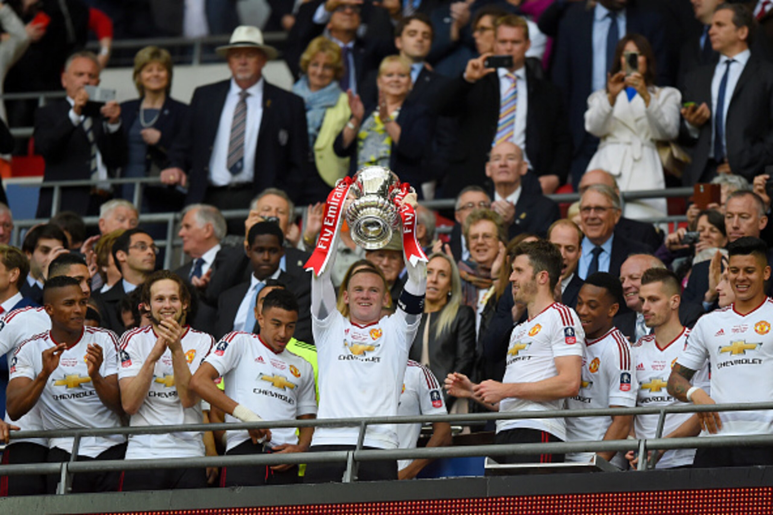 LONDON, ENGLAND - MAY 21:  Wayne Rooney of Manchester United lifts the trophy after winning The Emirates FA Cup Final match between Manchester United and Crystal Palace at Wembley Stadium on May 21, 2016 in London, England.  (Photo by Shaun Botterill/Gett
