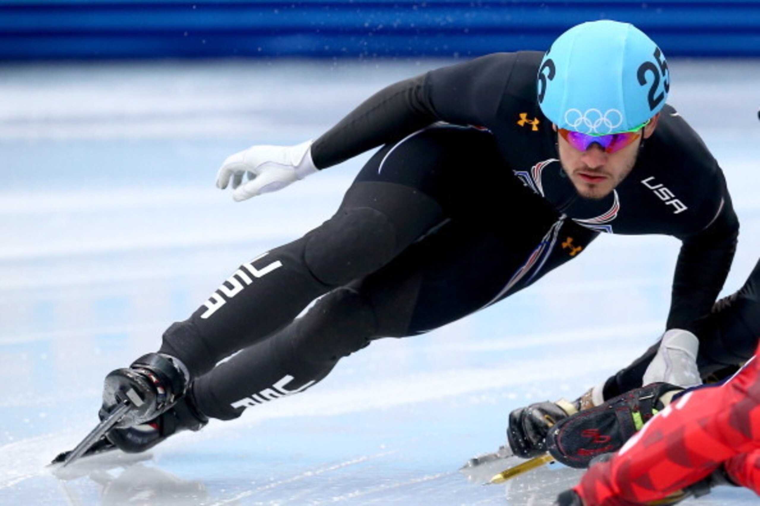 SOCHI, RUSSIA - FEBRUARY 10: Eddy Alvarez of the United States  competes in the Short Track Speed Skating Men's 1500m qualifying on day 3 of the Sochi 2014 Winter Olympics at Iceberg Skating Palace on February 10, 2014 in Sochi, Russia.  (Photo by Streete