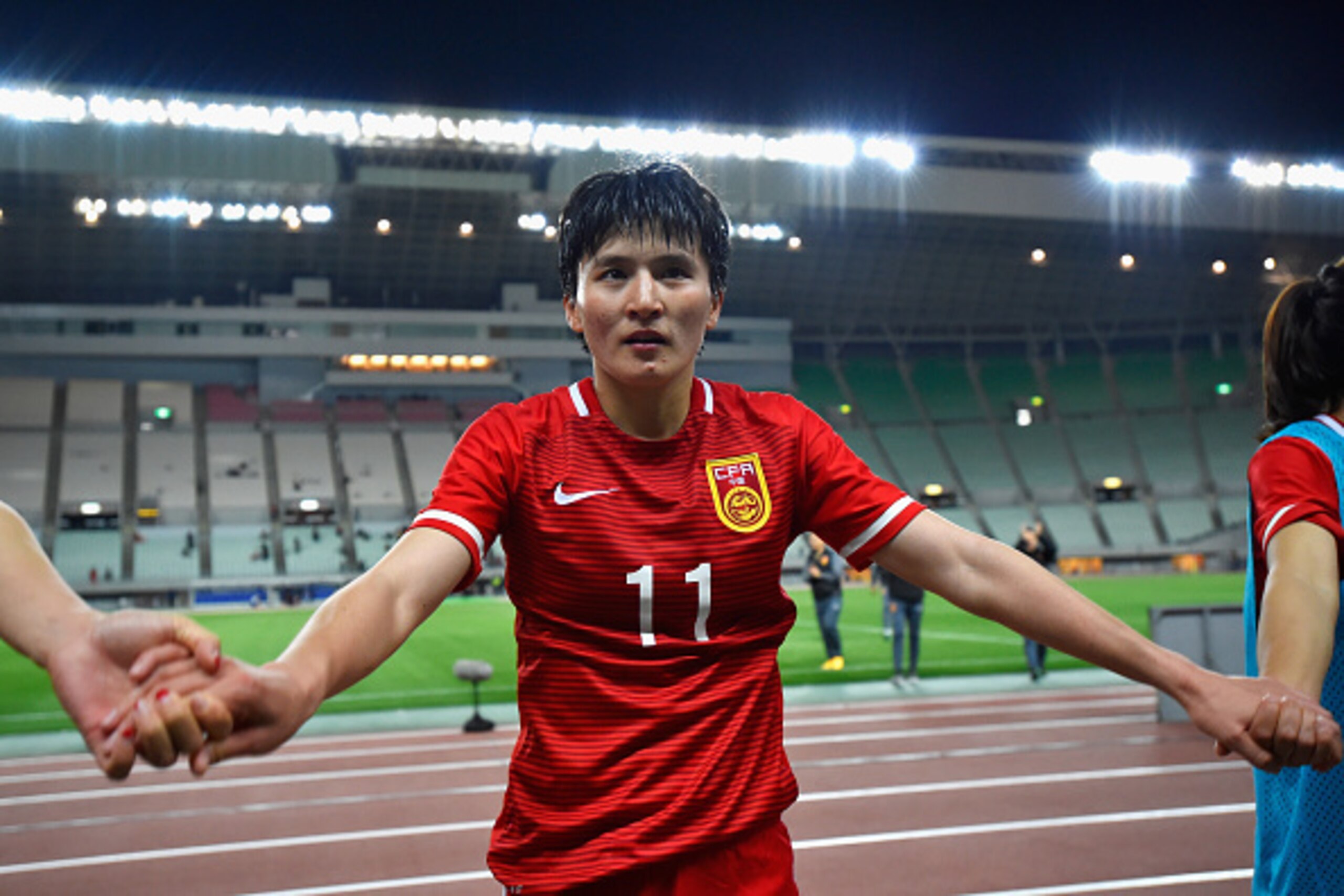 OSAKA, JAPAN - MARCH 07:  Wang Shanshan of China celebrates her team's 1-0 win after the AFC Women's Olympic Final Qualification Round match between China and South Korea at Yanmar Stadium Nagai on March 7, 2016 in Osaka, Japan.  (Photo by Koki Nagahama/G