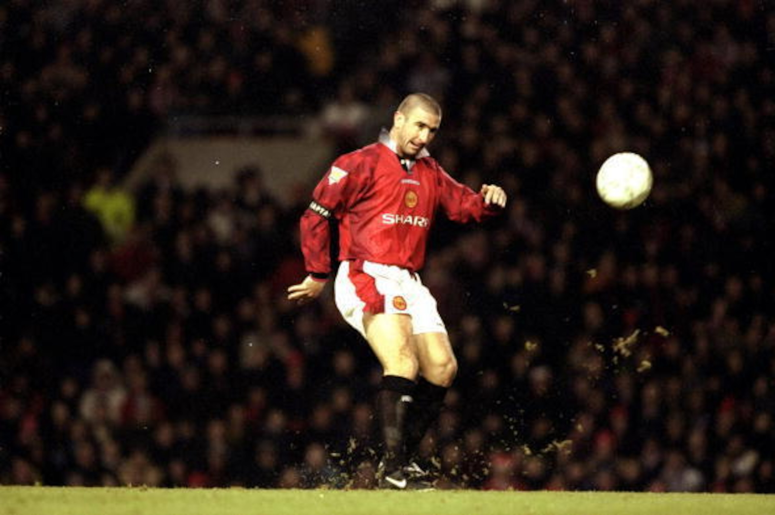 21 Dec 1996: Eric Cantona of Manchester United in action during an FA Carling Premiership match against Sunderland at Old Trafford in Manchester, England. Manchester United won the match 5-0. \ Mandatory Credit: Mark Thompson/Allsport 21 Dec 1996: Eric Cantona of Manchester United in action during an FA Carling Premiership match against Sunderland at Old Trafford in Manchester, England. Manchester United won the match 5-0. \ Mandatory Credit: Mark Thompson/Allsport