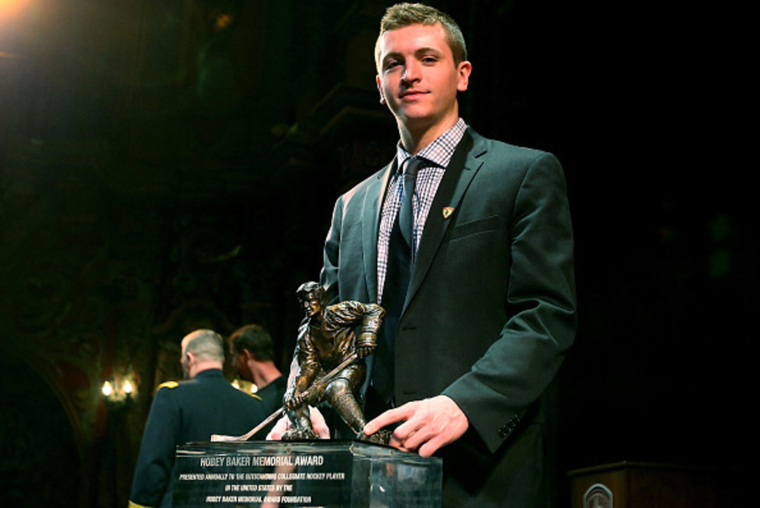 TAMPA, FLORIDA - APRIL 08:  Jimmy Vesey of Harvard University and Hobey Baker Award winner poses with the trophy after the 2016 Hobey Baker Memorial Award ceremony at Tampa Theatre on April 8, 2016 in Tampa, Florida.The Hobey Baker Award is given to colle