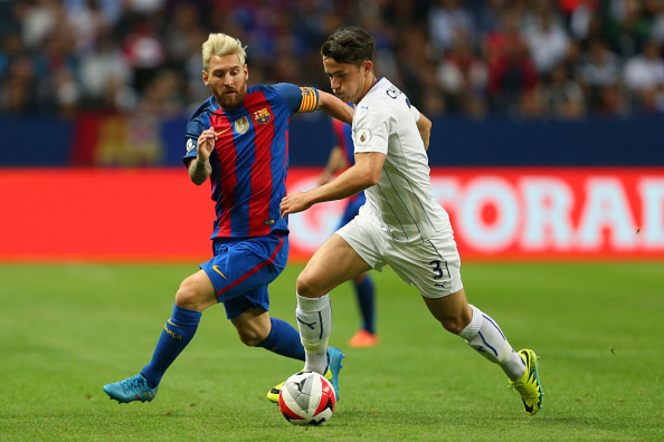 SOLNA, SWEDEN - AUGUST 03: Lionel Messi of FC Barcelona and Ben Chilwell of Leicester City during the International Champions Cup 2016 match between Barcelona and Leicester City at Friends arena on August 3, 2016 in Solna, Sweden. (Photo by Catherine Ivil