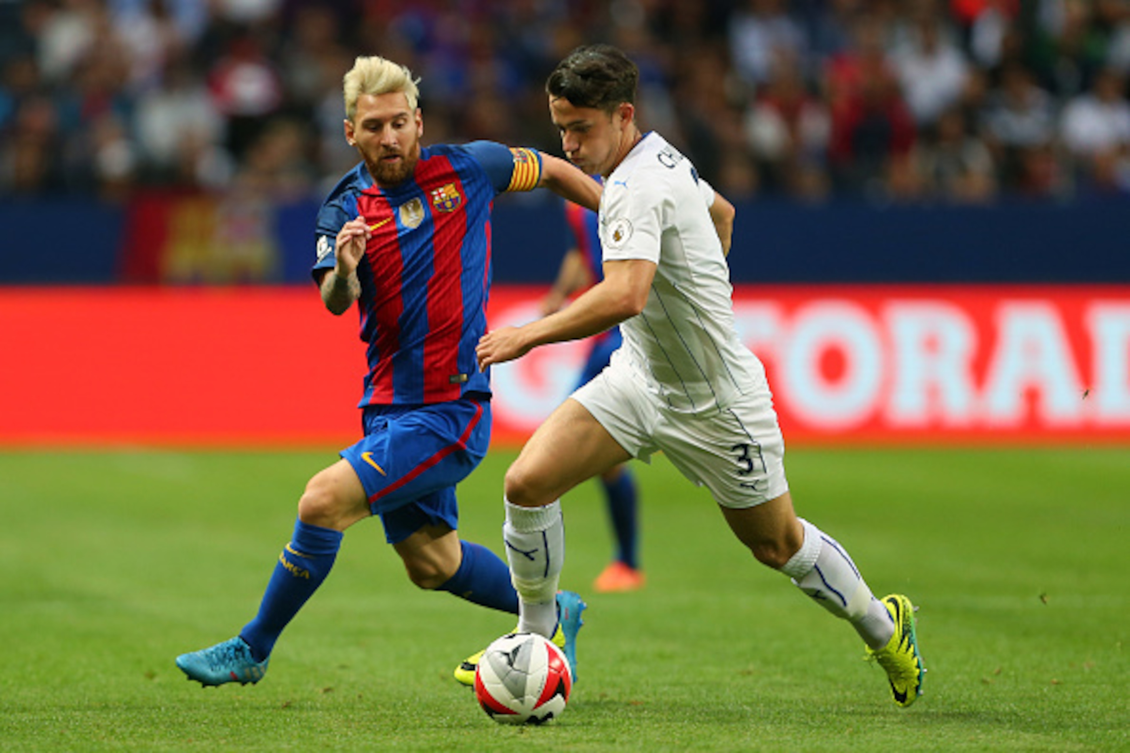 SOLNA, SWEDEN - AUGUST 03: Lionel Messi of FC Barcelona and Ben Chilwell of Leicester City during the International Champions Cup 2016 match between Barcelona and Leicester City at Friends arena on August 3, 2016 in Solna, Sweden. (Photo by Catherine Ivil