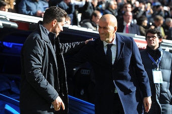 MADRID, SPAIN - FEBRUARY 27:  Manager Diego Simeone of Club Atletico de Madrid greets Real Madrid manager Zinedine Zidane during the La Liga match between Real Madrid CF and Club Atletico de Madrid at Estadio Santiago Bernabeu on February 27, 2016 in Madr