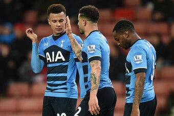 STOKE ON TRENT, ENGLAND - APRIL 18:  Dele Alli of Tottenham Hotspur (L) celebrates with Kyle Walker and Danny Rose as he scores their fourth goal and his second during the Barclays Premier League match between Stoke City and Tottenham Hotspur at the Brita