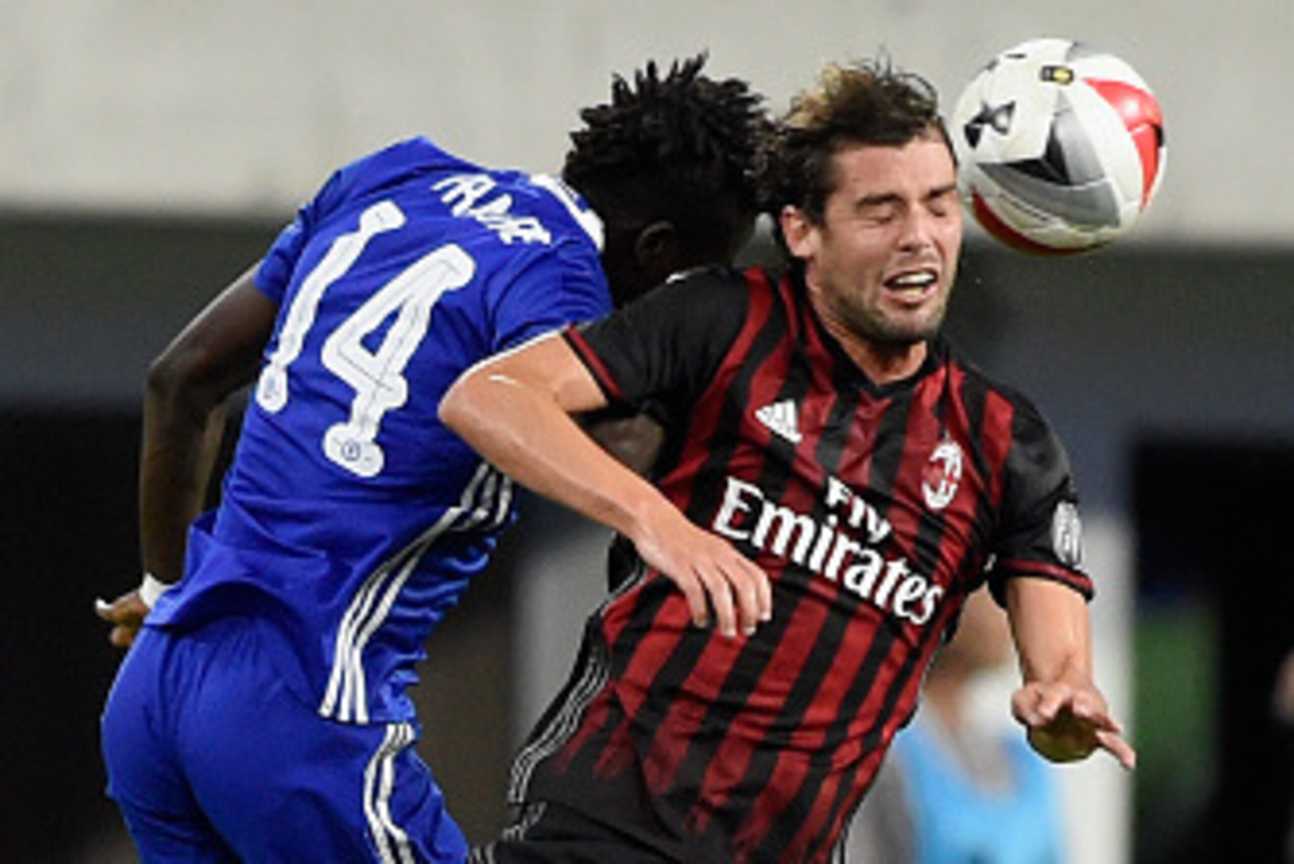 MINNEAPOLIS, MN - AUGUST 3: Bertrand Traore #14 of Chelsea and Andrea Poli #16 of AC Milan go for a header during the first half of the International Champions Cup match on August 3, 2016 at U.S. Bank Stadium in Minneapolis, Minnesota. (Photo by Hannah Fo