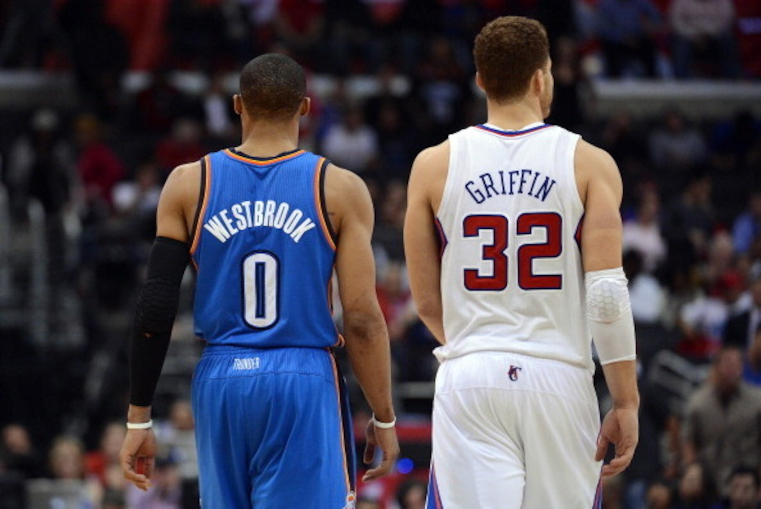 LOS ANGELES, CA - JANUARY 22:  Russell Westbrook #0 of the Oklahoma City Thunder and Blake Griffin #32 of the Los Angeles Clippers walk to center court during a 109-97 Thunder win at Staples Center on January 22, 2013 in Los Angeles, California.  NOTE TO 
