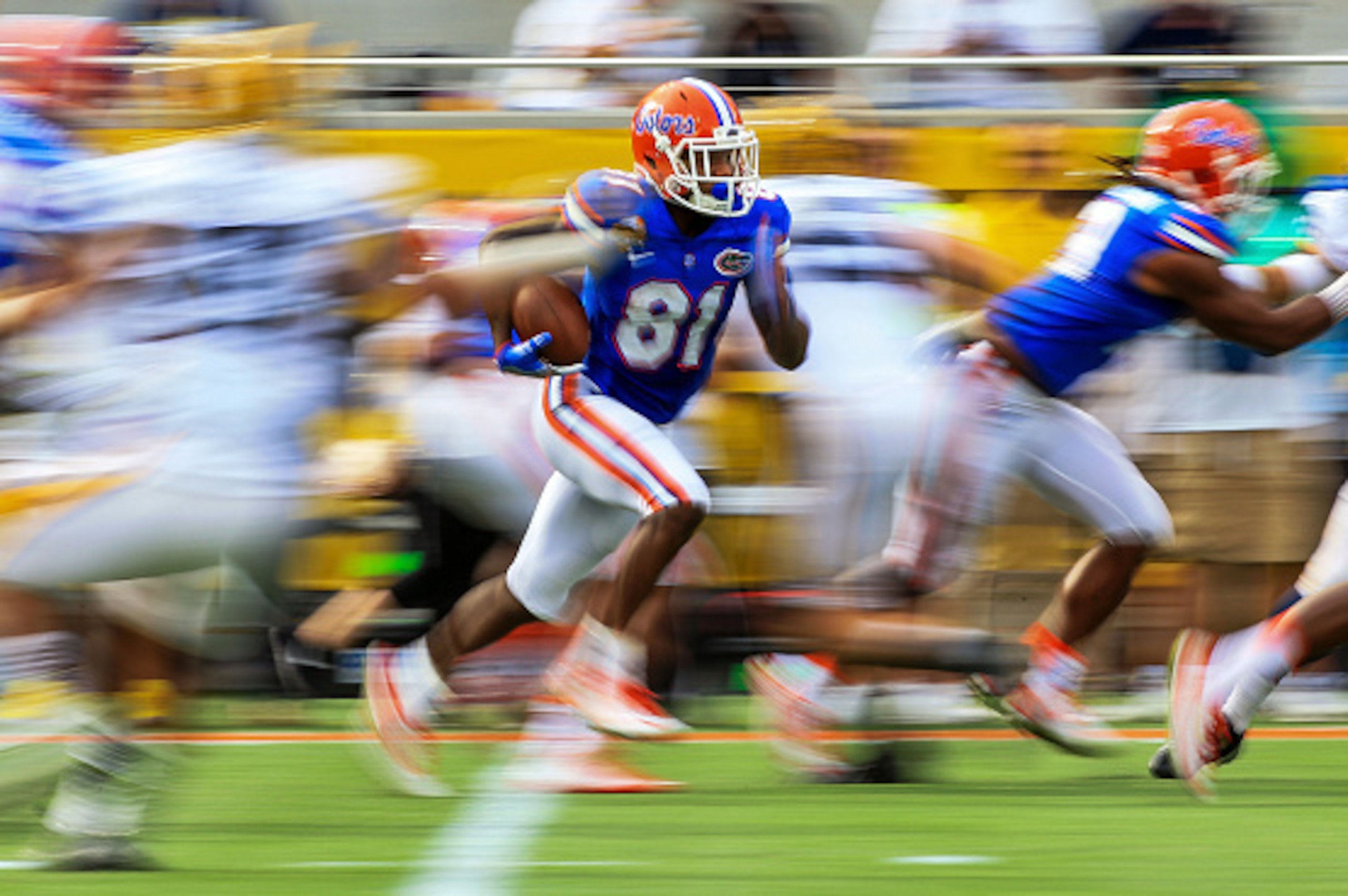 ORLANDO, FL - JANUARY 01: Antonio Callaway #81 of the Florida Gators rushes during the first half of the Buffalo Wild Wings Citrus Bowl game against the Michigan Wolverines at Orlando Citrus Bowl on January 1, 2016 in Orlando, Florida.  (Photo by Rob Fold