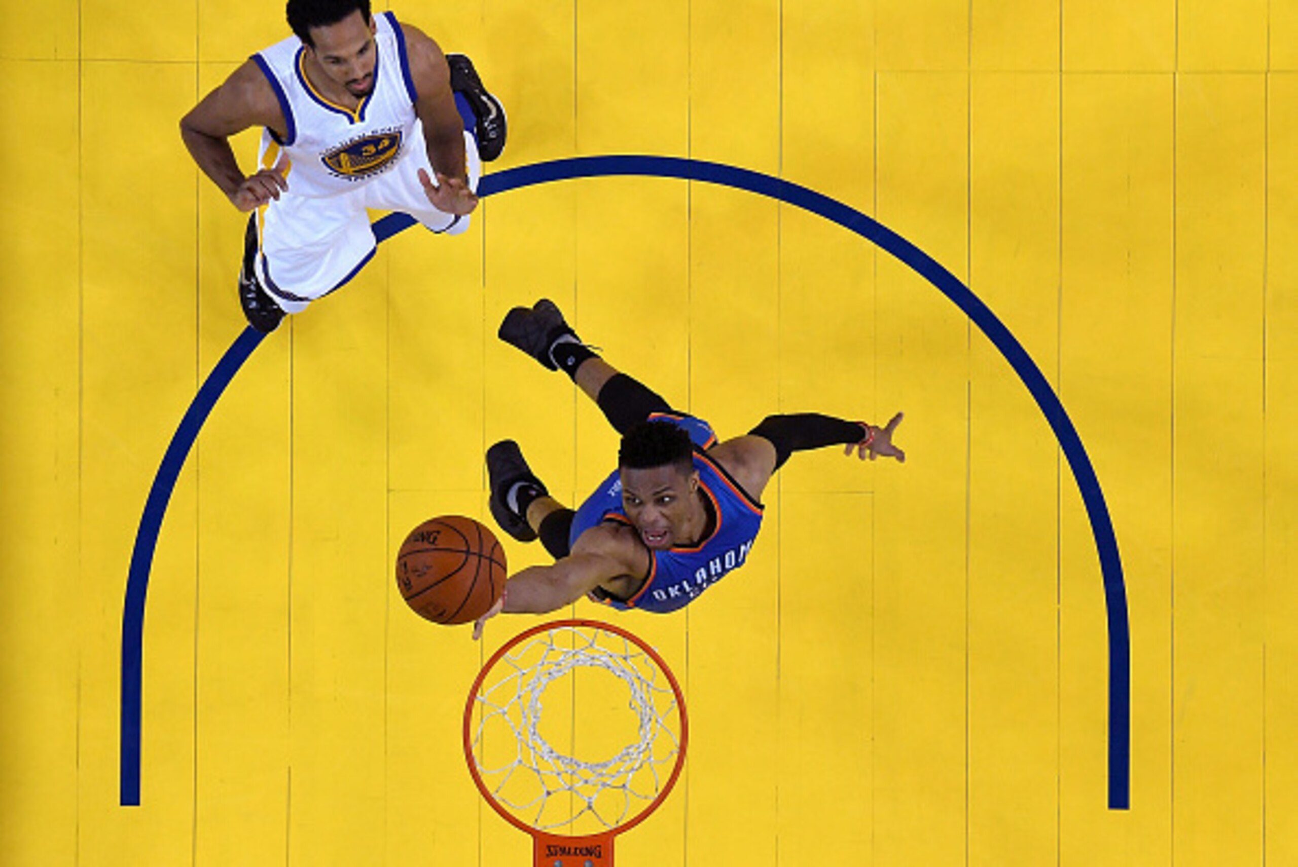 OAKLAND, CA - MAY 30:  Russell Westbrook #0 of the Oklahoma City Thunder goes up for a layup in front of Shaun Livingston #34 of the Golden State Warriors in Game Seven of the Western Conference Finals during the 2016 NBA Playoffs at ORACLE Arena on May 3