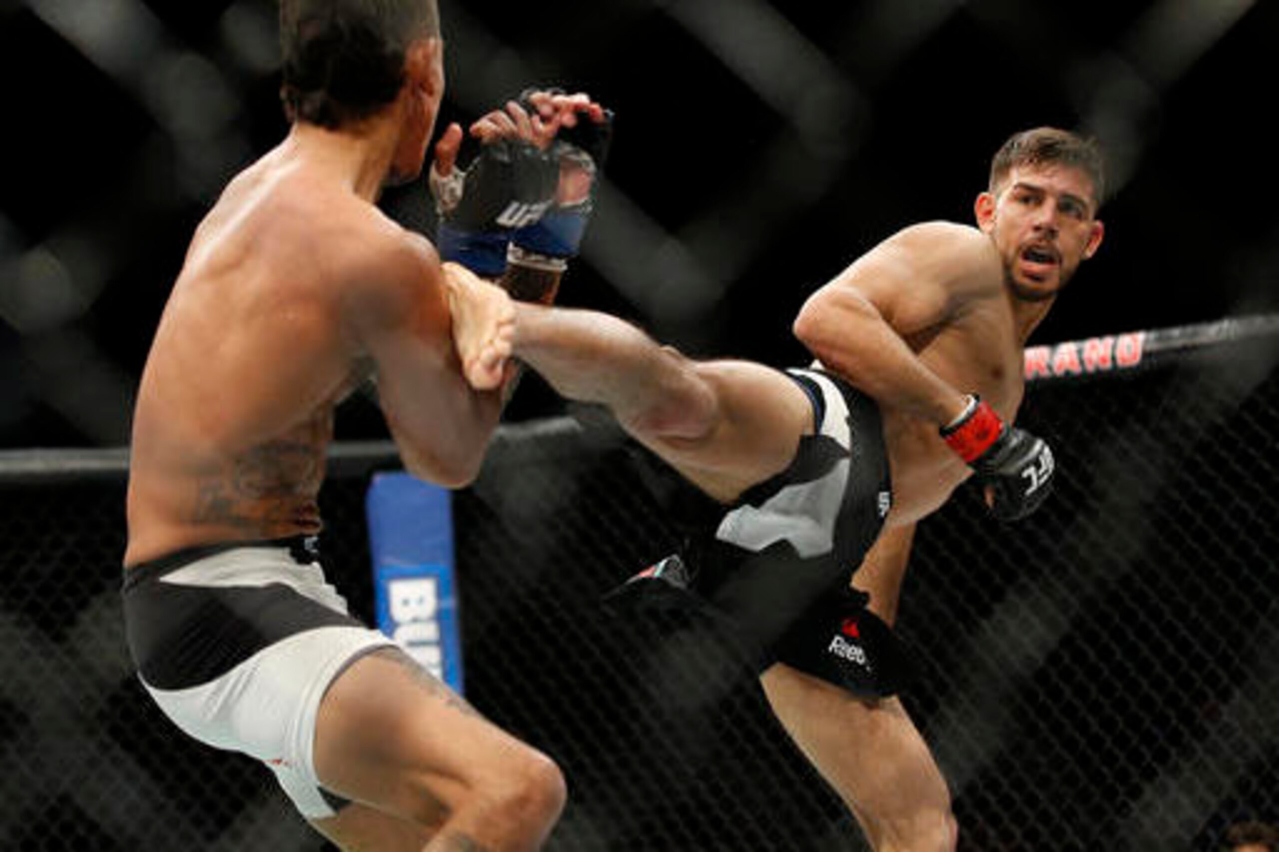 Rodriguez fires a kick at Andre Fili.