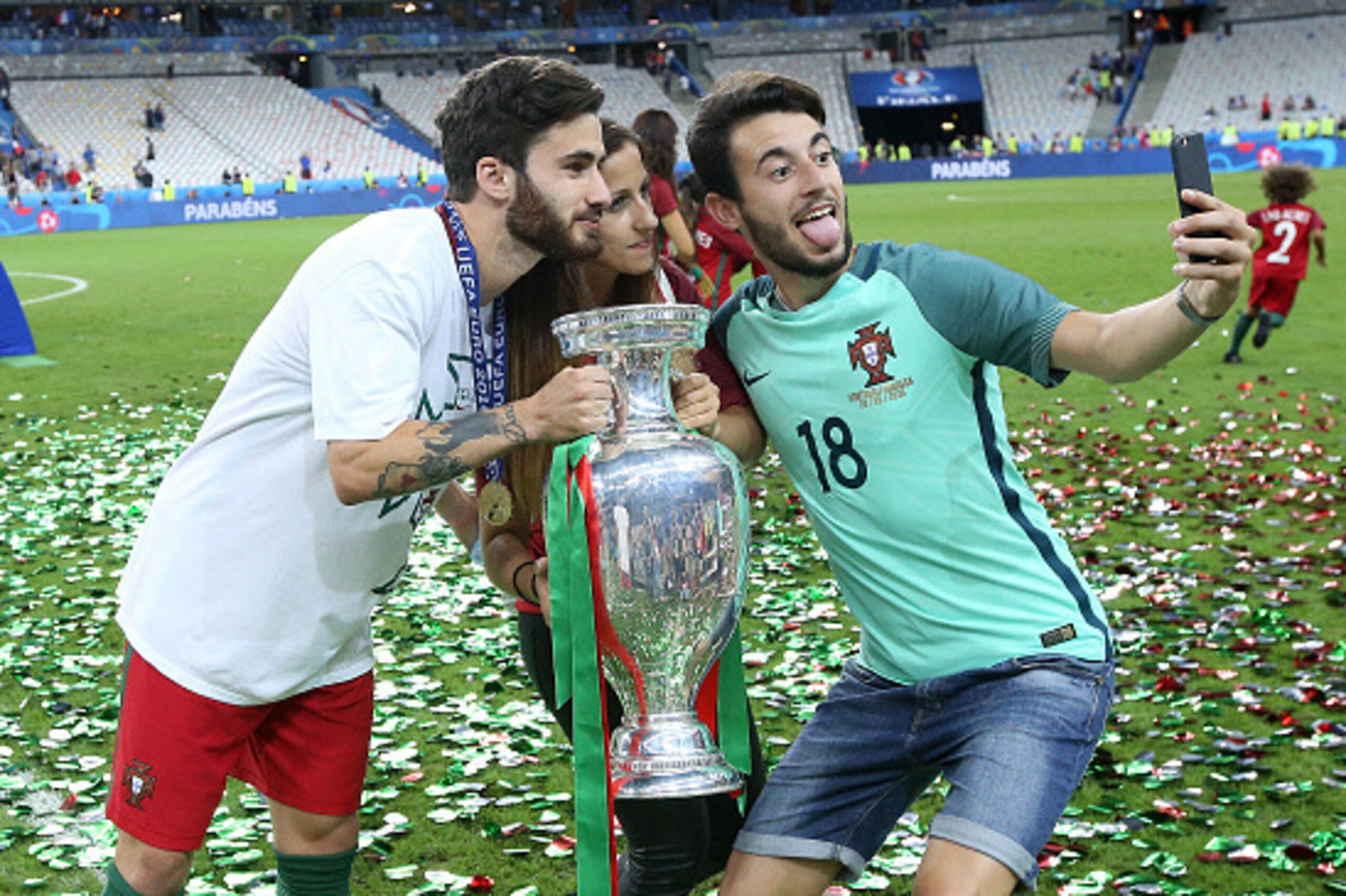 PARIS, FRANCE - JULY 10: Rafa Silva of Portugal poses with the trophy following the UEFA Euro 2016 final match between Portugal and France at Stade de France on July 10, 2016 in Saint-Denis near Paris, France. (Photo by Jean Catuffe/Getty Images)