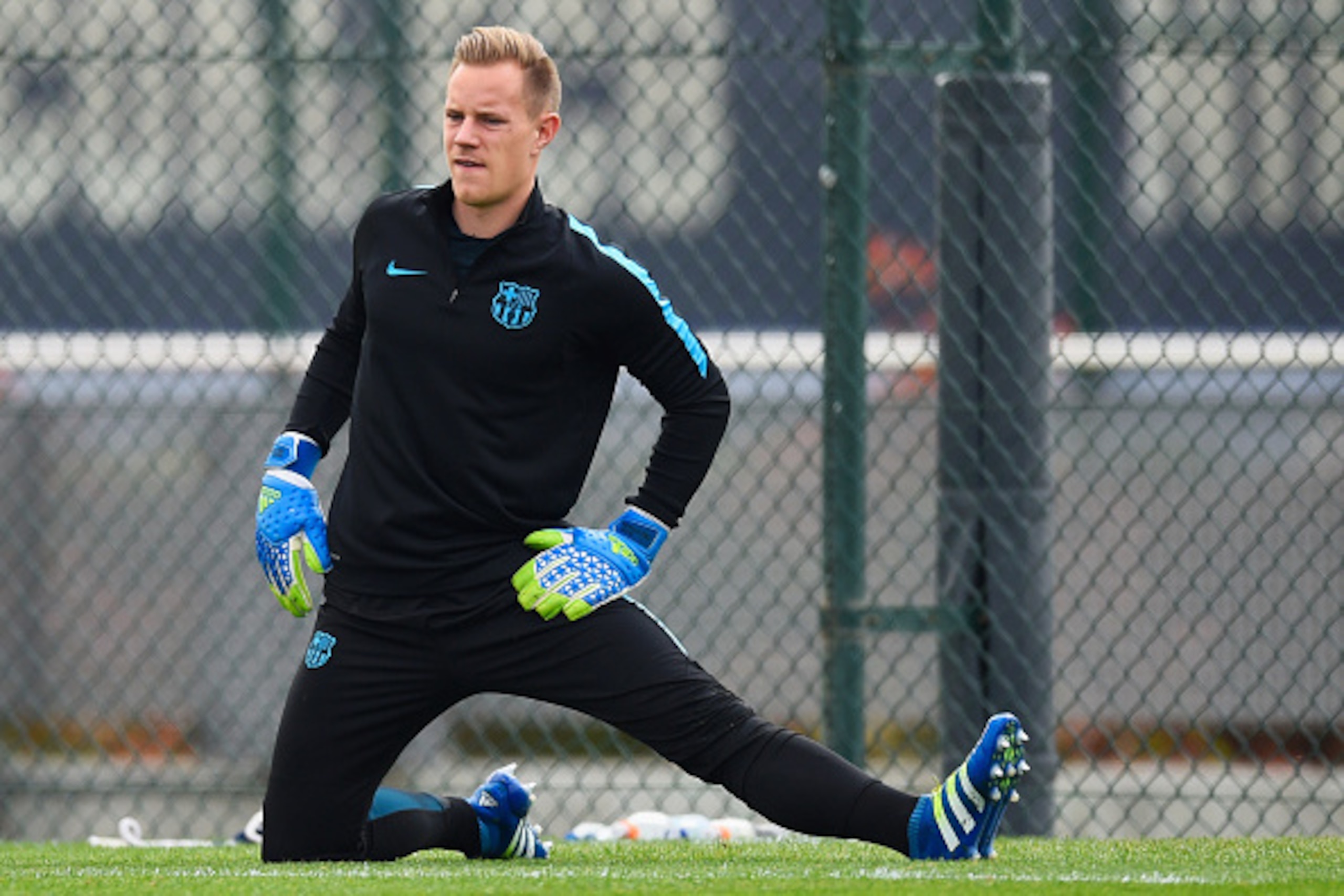 BARCELONA, SPAIN - APRIL 04: Marc-Andre ter Stegen stretches during a Barcelona training session ahead of their UEFA Champions League quarter final first leg match against Atletico Madrid at San Joan Despi training ground on April 4, 2016 in Barcelona, S BARCELONA, SPAIN - APRIL 04: Marc-Andre ter Stegen stretches during a Barcelona training session ahead of their UEFA Champions League quarter final first leg match against Atletico Madrid at San Joan Despi training ground on April 4, 2016 in Barcelona, S