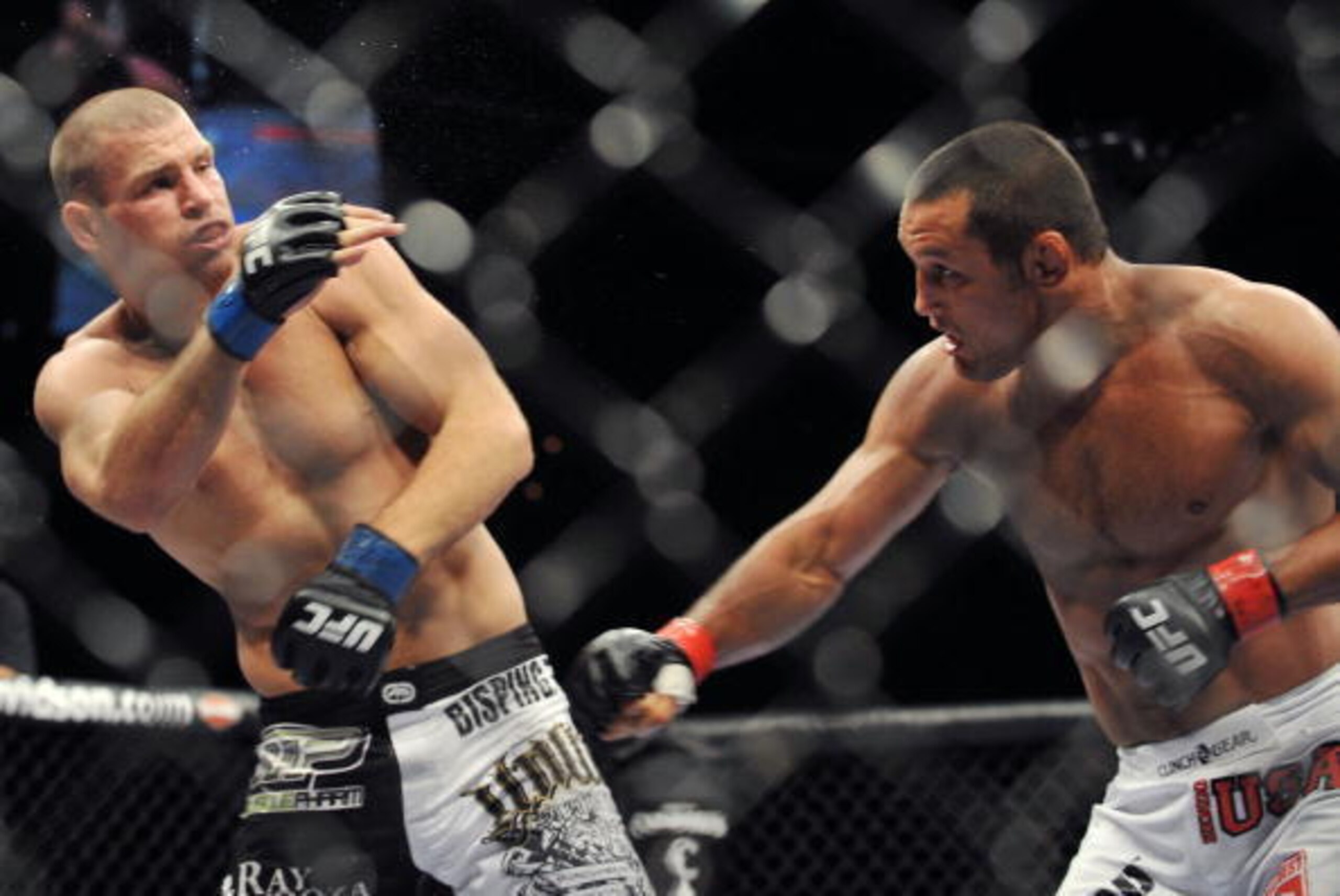 LAS VEGAS - JULY 11:  UFC Middleweights Dan Henderson (R) battles Michael Bisping (L) during their Middleweight bout at UFC 100 the Mandalay Bay Hotel and Casino on July 11, 2009 in Las Vegas, Nevada.  (Photo by Jon Kopaloff/Getty Images)