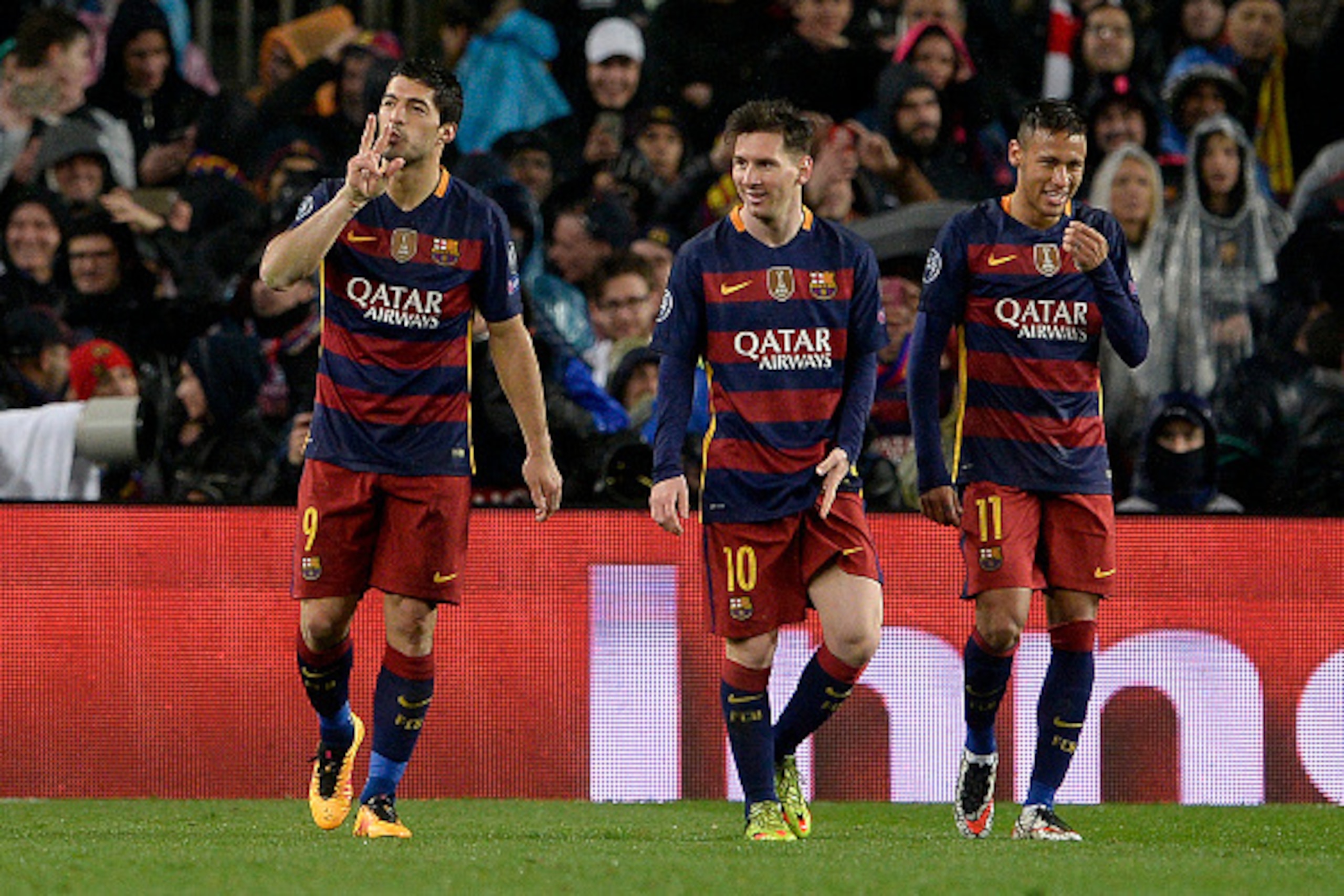 Barcelona's Uruguayan forward Luis Suarez (L) celebrates his goal with Barcelona's Argentinian forward Lionel Messi (C) and Barcelona's Brazilian forward Neymar (R) during the UEFA Champions League Round of 16 second leg football match FC Barcelona vs Ars