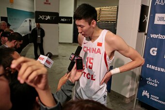OAKLAND, CA - JULY 26:  Zhou Qi #15 of the Chinese Men's National Team talks to the media after the game against the USA Men's National Team during the USA Basketball Showcase at Oracle Arena on July 26, 2016 in Oakland, California.  NOTE TO USER: User ex