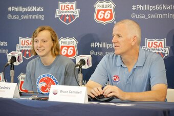 IRVINE, CA - AUGUST 05:  Katie Ledecky and Coach Bruce Gemmell speak during the 2014 Phillips 66 USA National Championships Press Conference at the William Woollett Jr. Aquatics Complex on August 5, 2014 in Irvine, California.  (Photo by Joe Scarnici/Gett