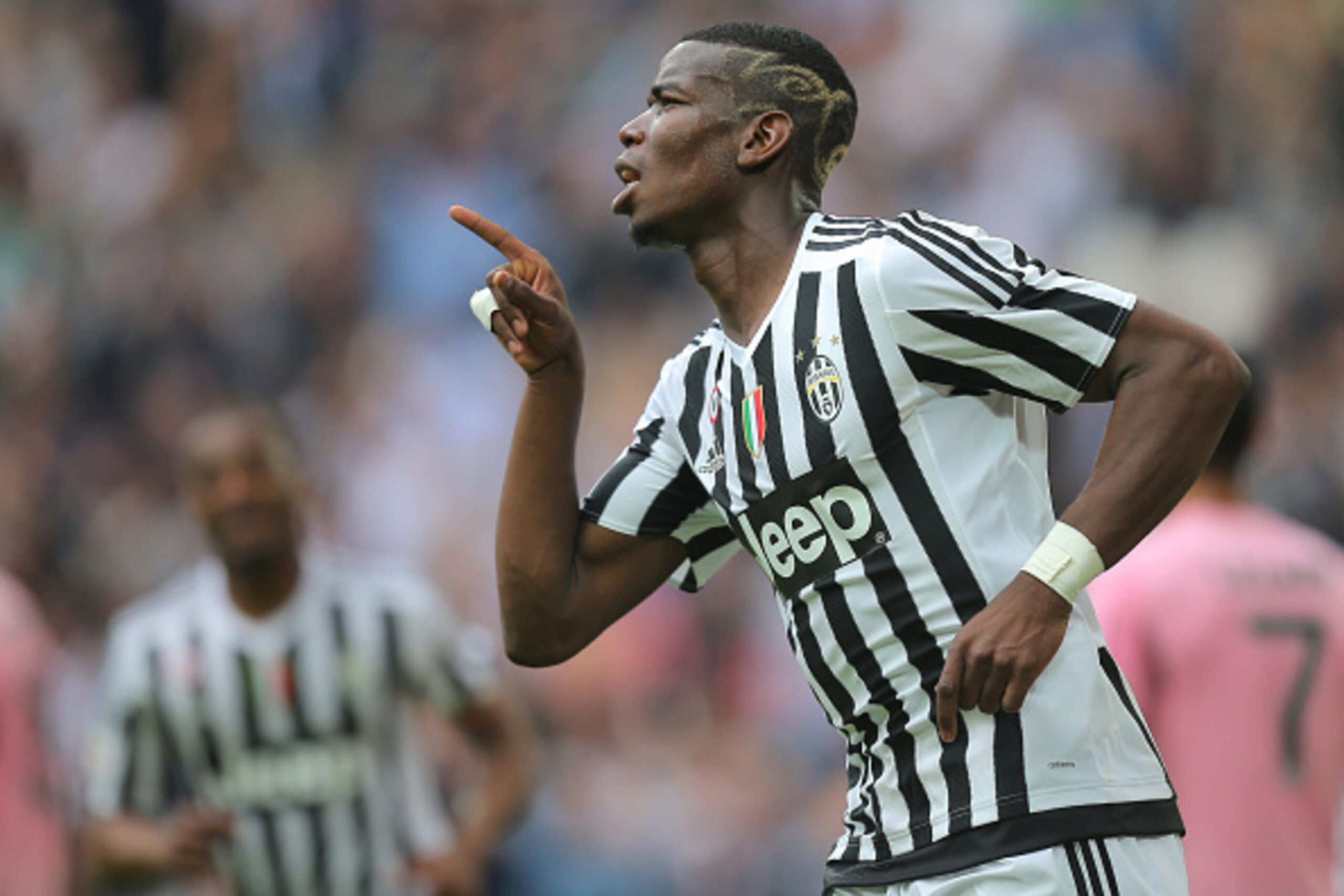 Juventus' midfielder Paul Pogba from France celebrates after scoring during the Italian Serie A football match Juventus vs Palermo on April 17, 2016 at the Juventus stadium in Turin.  / AFP / MARCO BERTORELLO        (Photo credit should read MARCO BERTORE