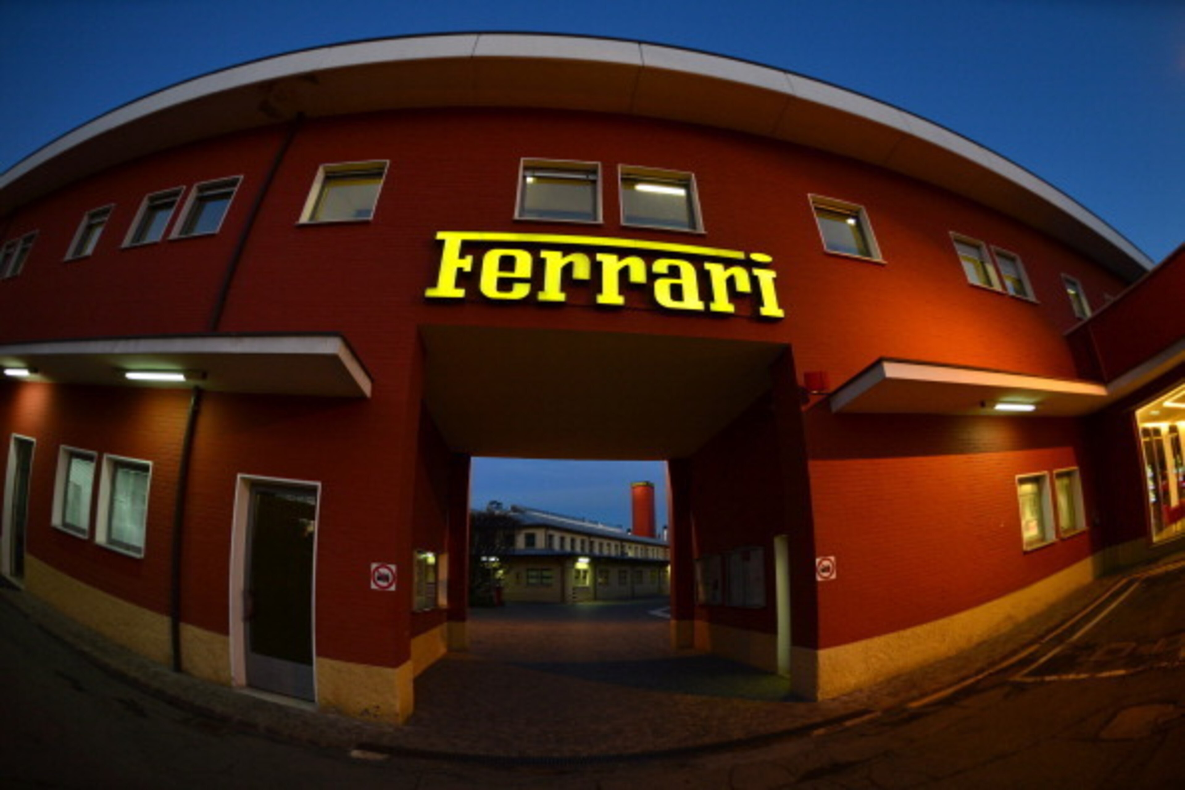 This picture shows the entrance of the Ferrari factory on December 5, 2012 in Maranello. The Ferrari 45 buildings's factory, where more than 3,000 workers produce the companyโs GT and Formula 1 cars is based in Maranello. AFP PHOTO / GABRIEL BOUYS This picture shows the entrance of the Ferrari factory on December 5, 2012 in Maranello. The Ferrari 45 buildings's factory, where more than 3,000 workers produce the companyโs GT and Formula 1 cars is based in Maranello. AFP PHOTO / GABRIEL BOUYS