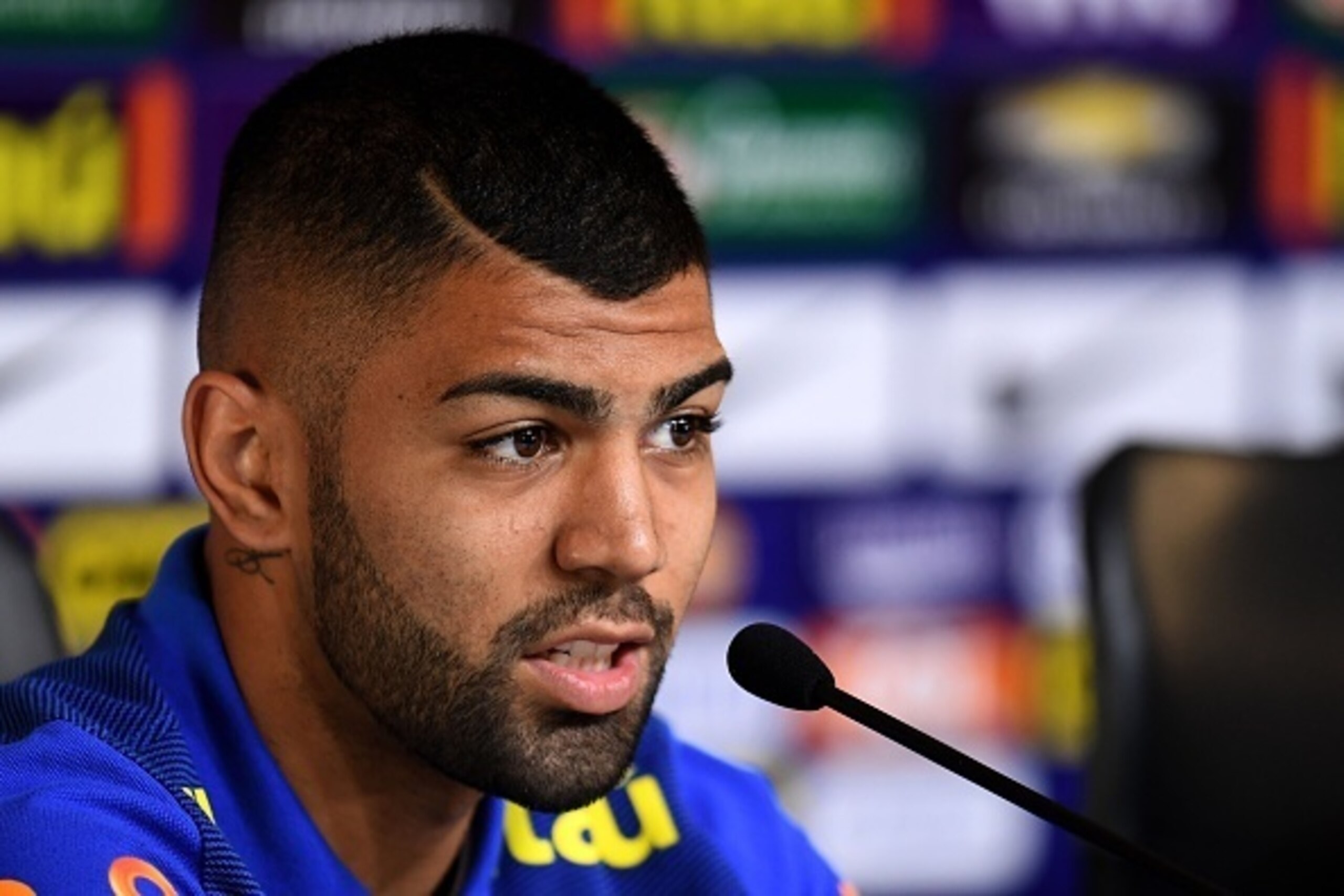 Brazilian footballer Gabriel Barbosa speaks during a press conference of the Olympic team at the Serra Dourada Stadium in Goiania, Goias State, Brazil, on July 28, 2016 ahead of the Rio 2016 Olympic Games. 
The Rio 2016 Olympic and Paralympic Games will b