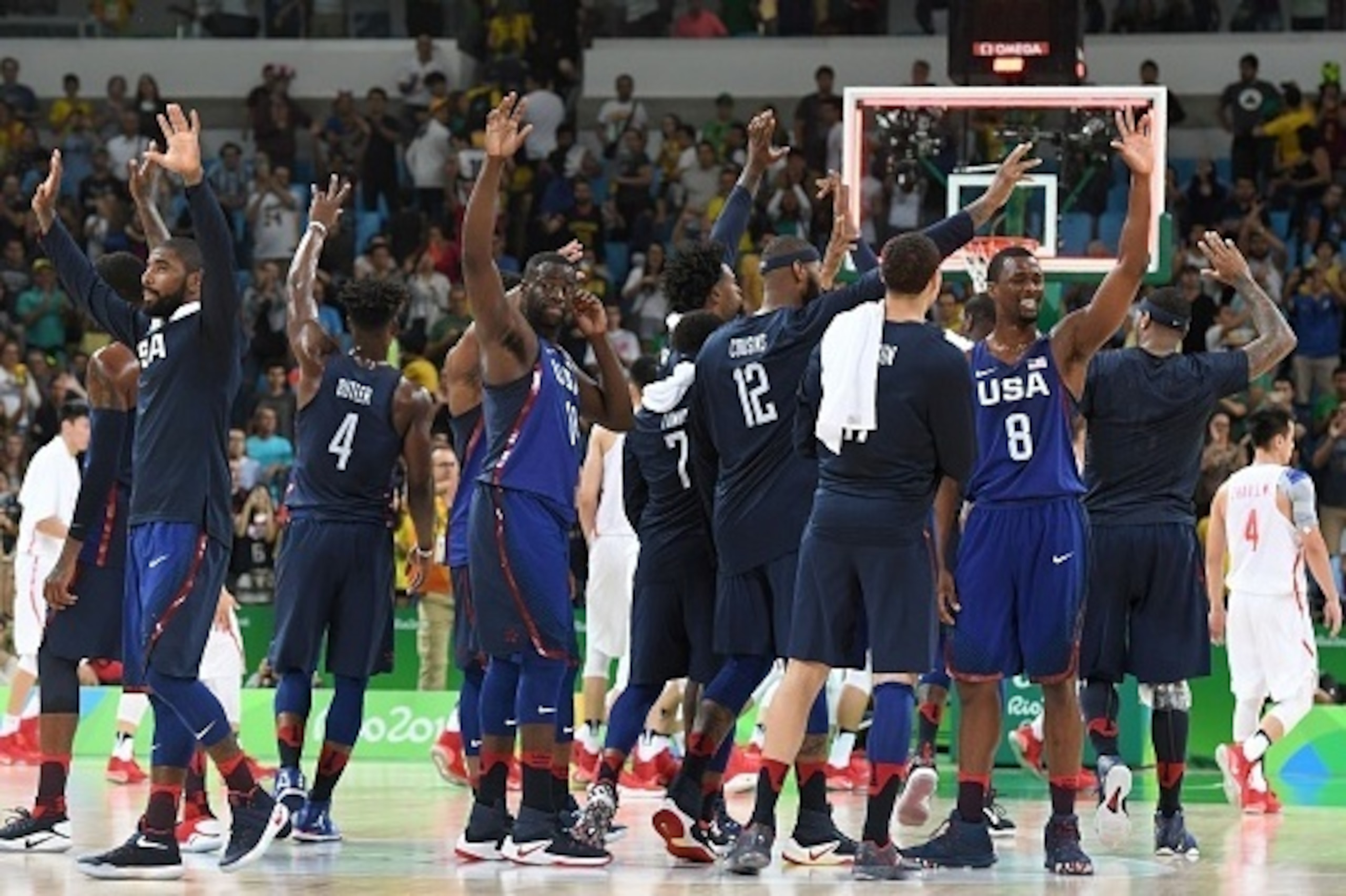(From L) USA's guard Kyrie Irving, USA's forward Jimmy Butler, USA's forward Draymond Green, USA's guard Kyle Lowry, USA's centre DeMarcus Cousins and USA's forward Harrison Barnes celebrates after  a Men's round Group A basketball match between China and